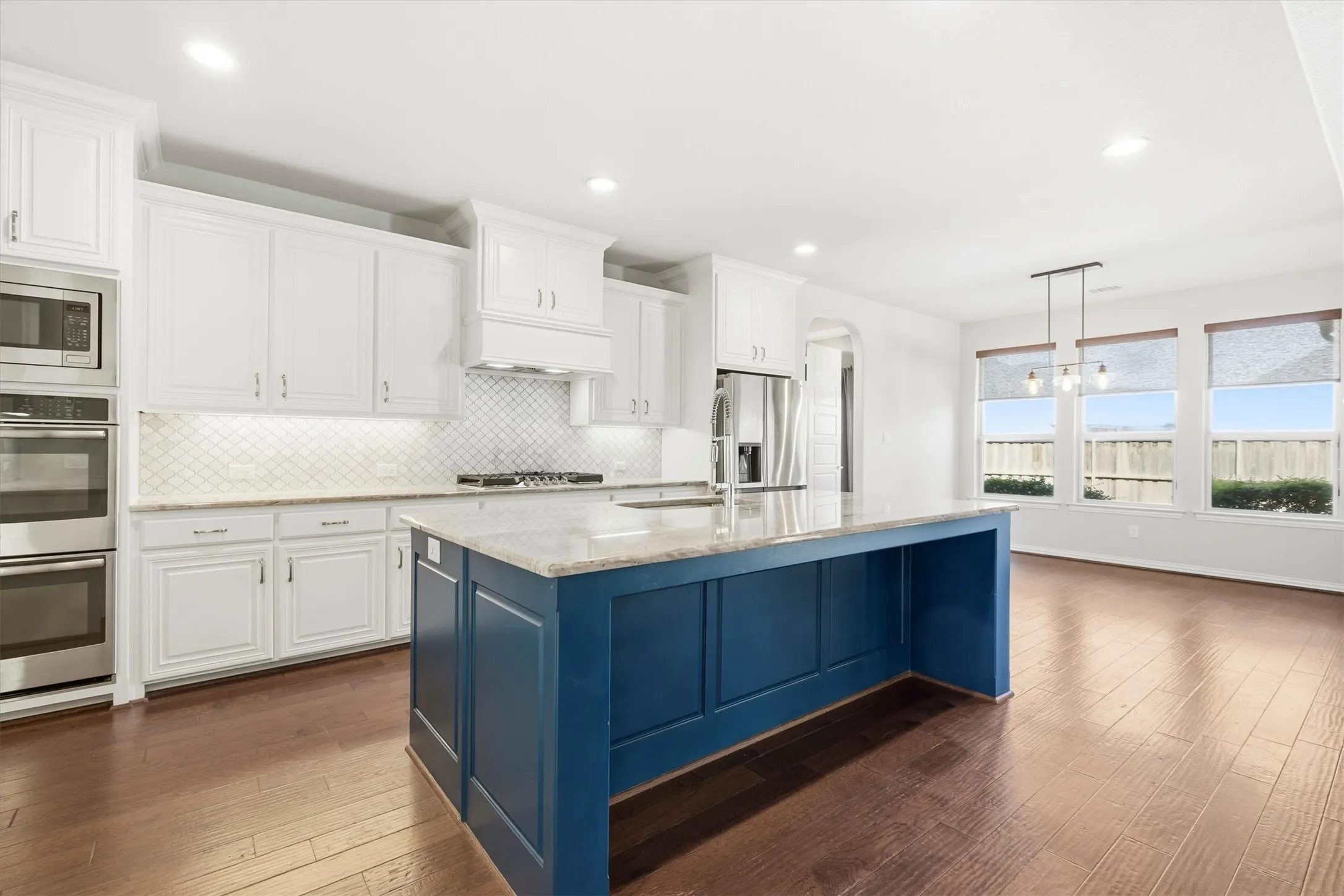 Gorgeous kitchen, large center island, double ovens, pretty granite and backsplash