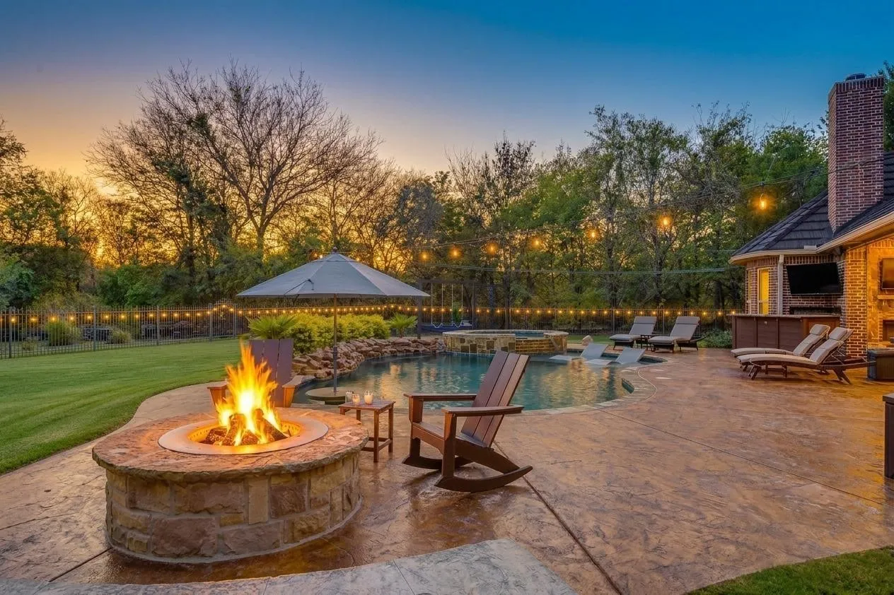 The gorgeous backyard is truly a private retreat with saltwater pool, hot tub and firepit with Breeo all stainless, smokeless fire pit insert with lid and heat deflector.