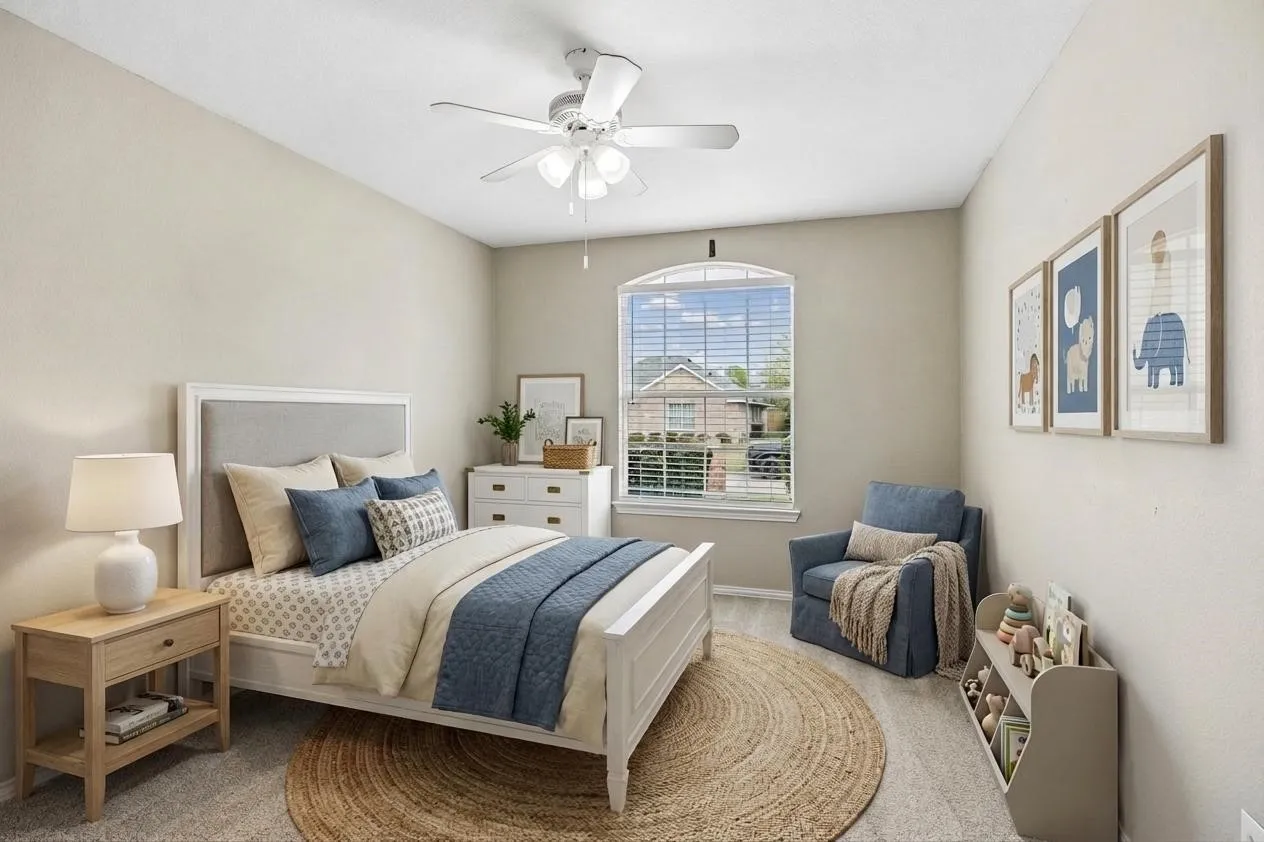 Secondary bedroom 3 with fresh carpet, neutral paint, and flexible use.