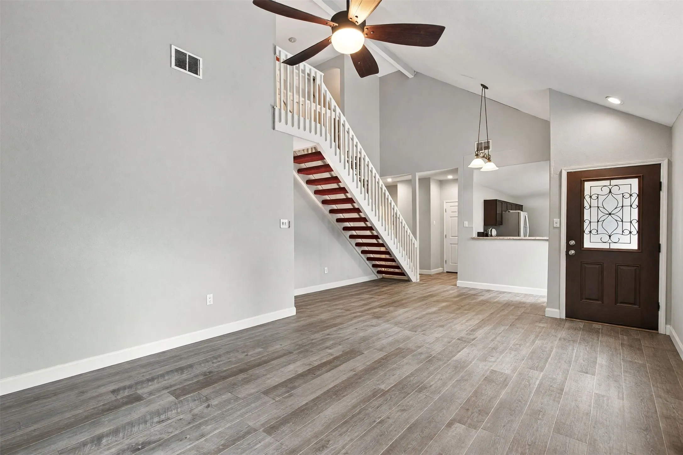 Digitally removed furnishings to show floors and space