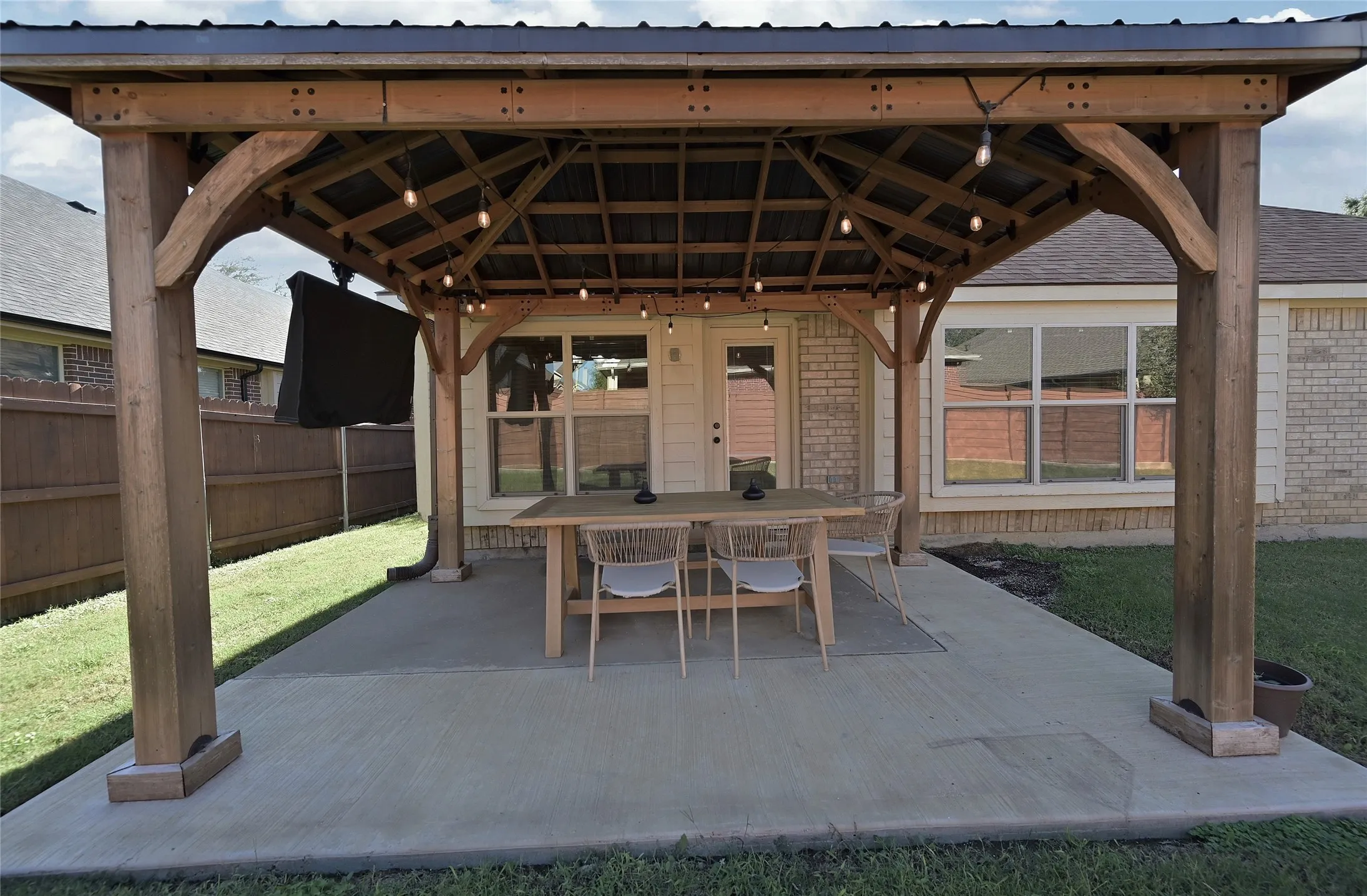 Large covered pergola
with string lights
