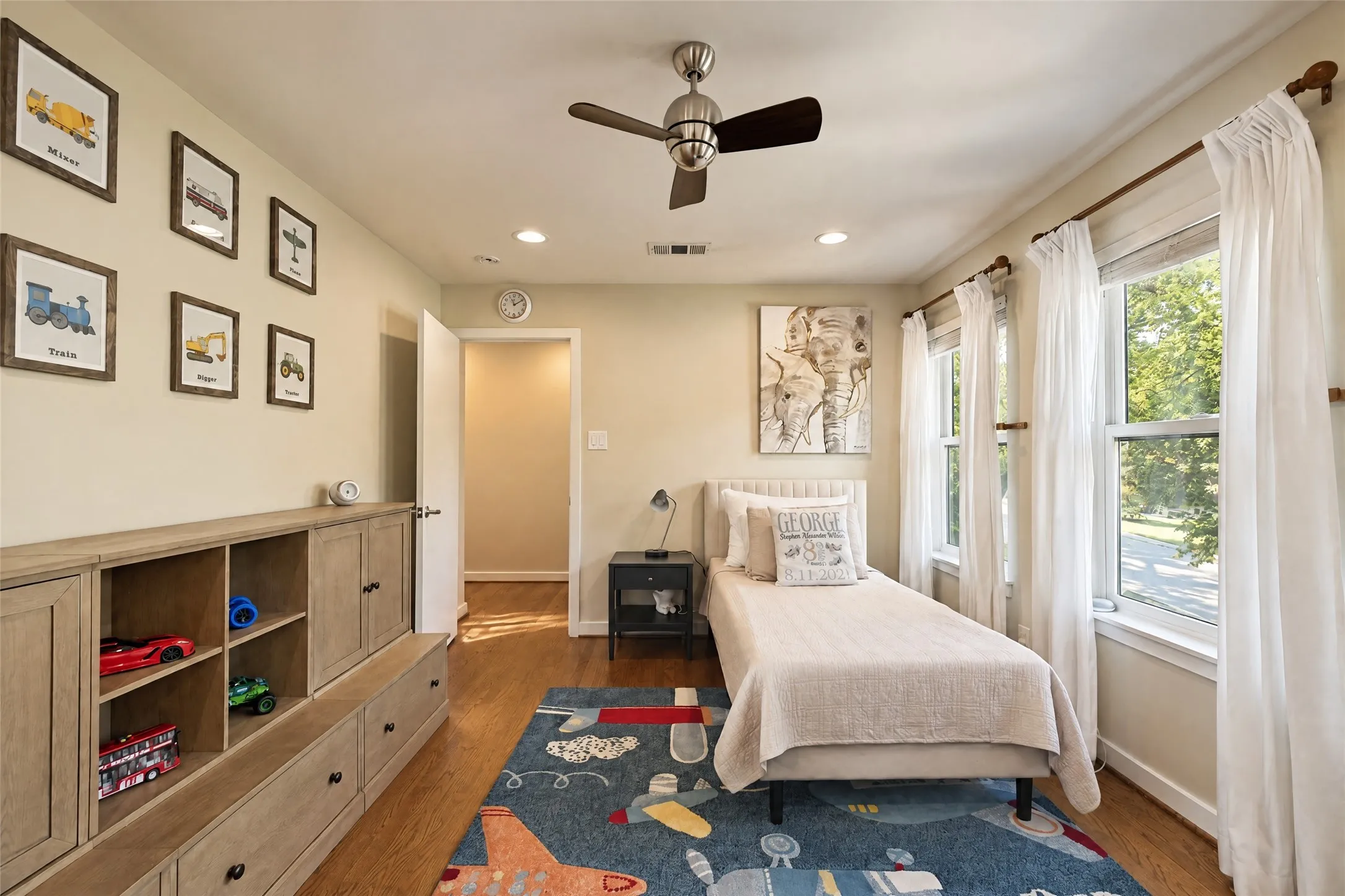 Wood-finish flooring, recessed lighting, and a ceiling fan