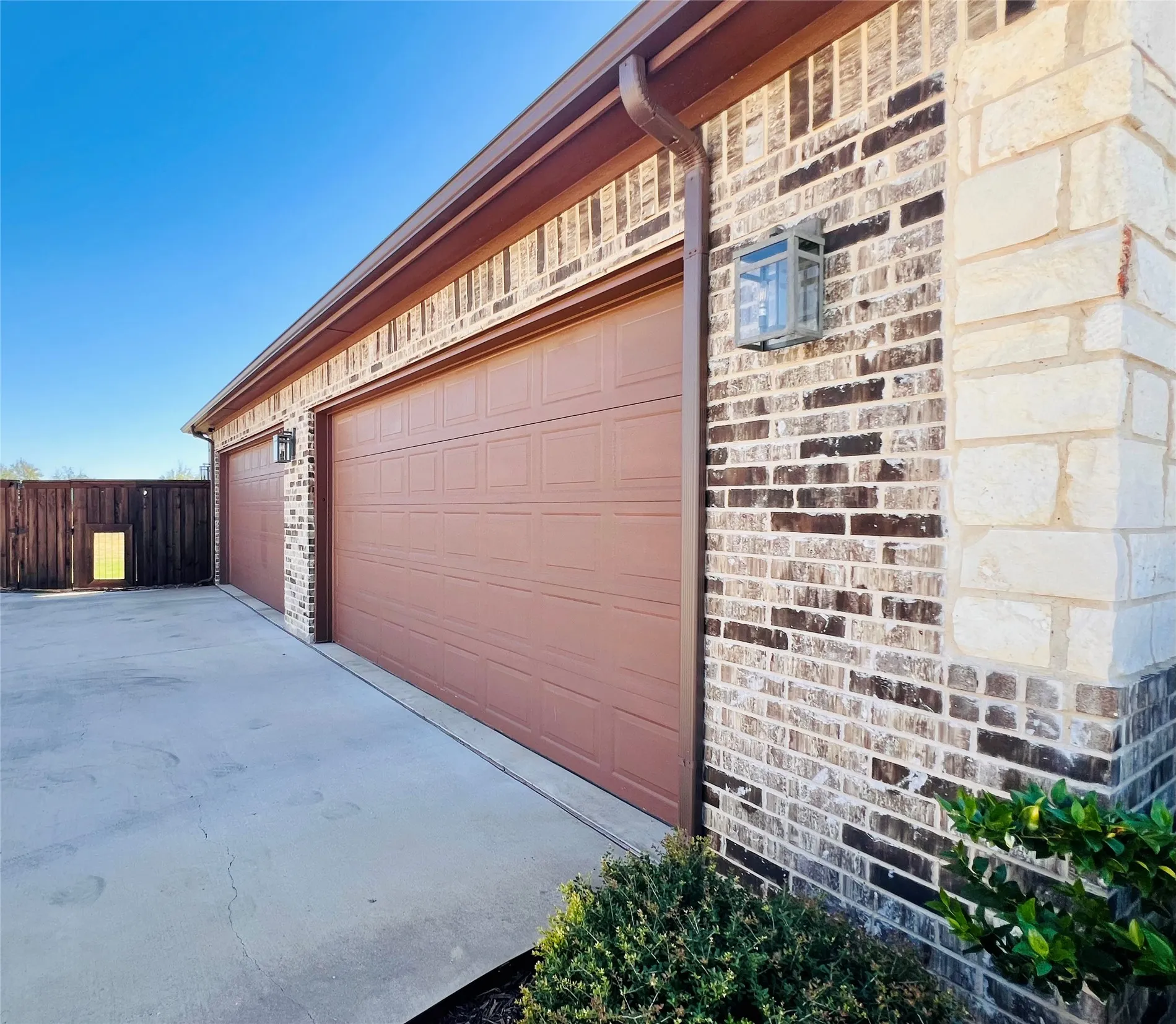 4 car garage for the cars, toys or have a shop on one side.