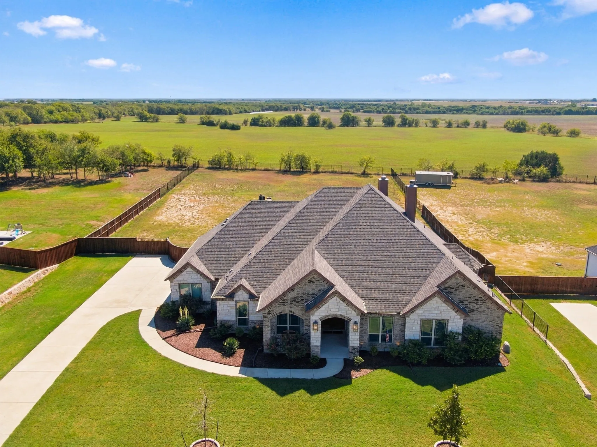Expansive property on a 1.133 acre lot that backs to farm land.