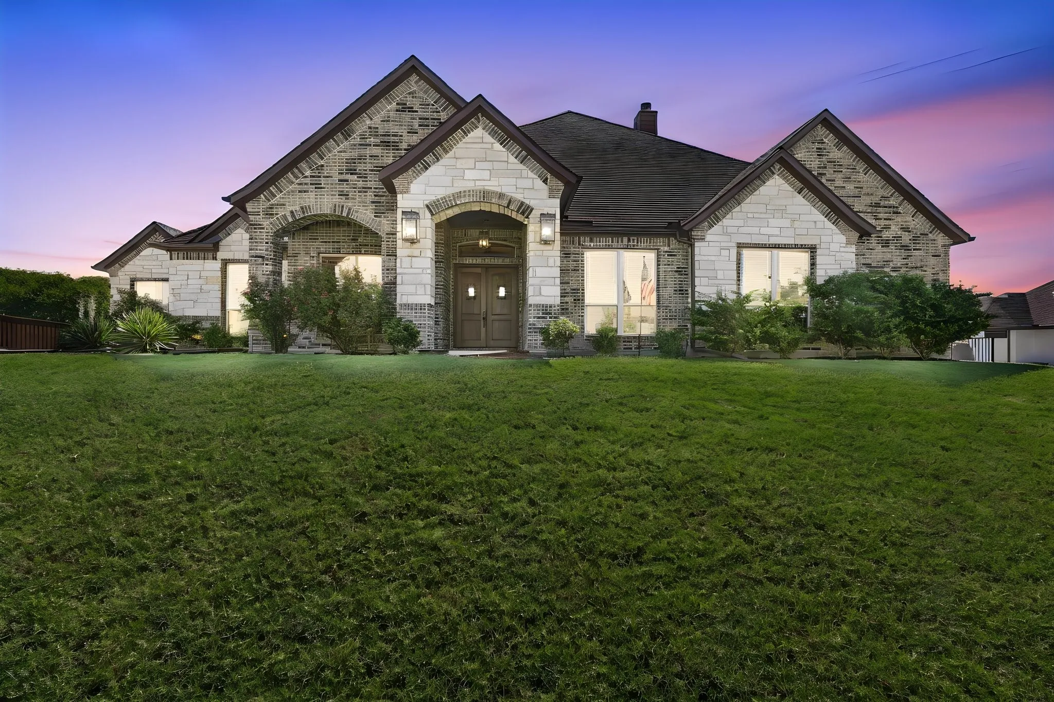 You'll love the covered patio featuring a stone fireplace, TV Cabinet with Cedar doors and multiple ceiling fans.