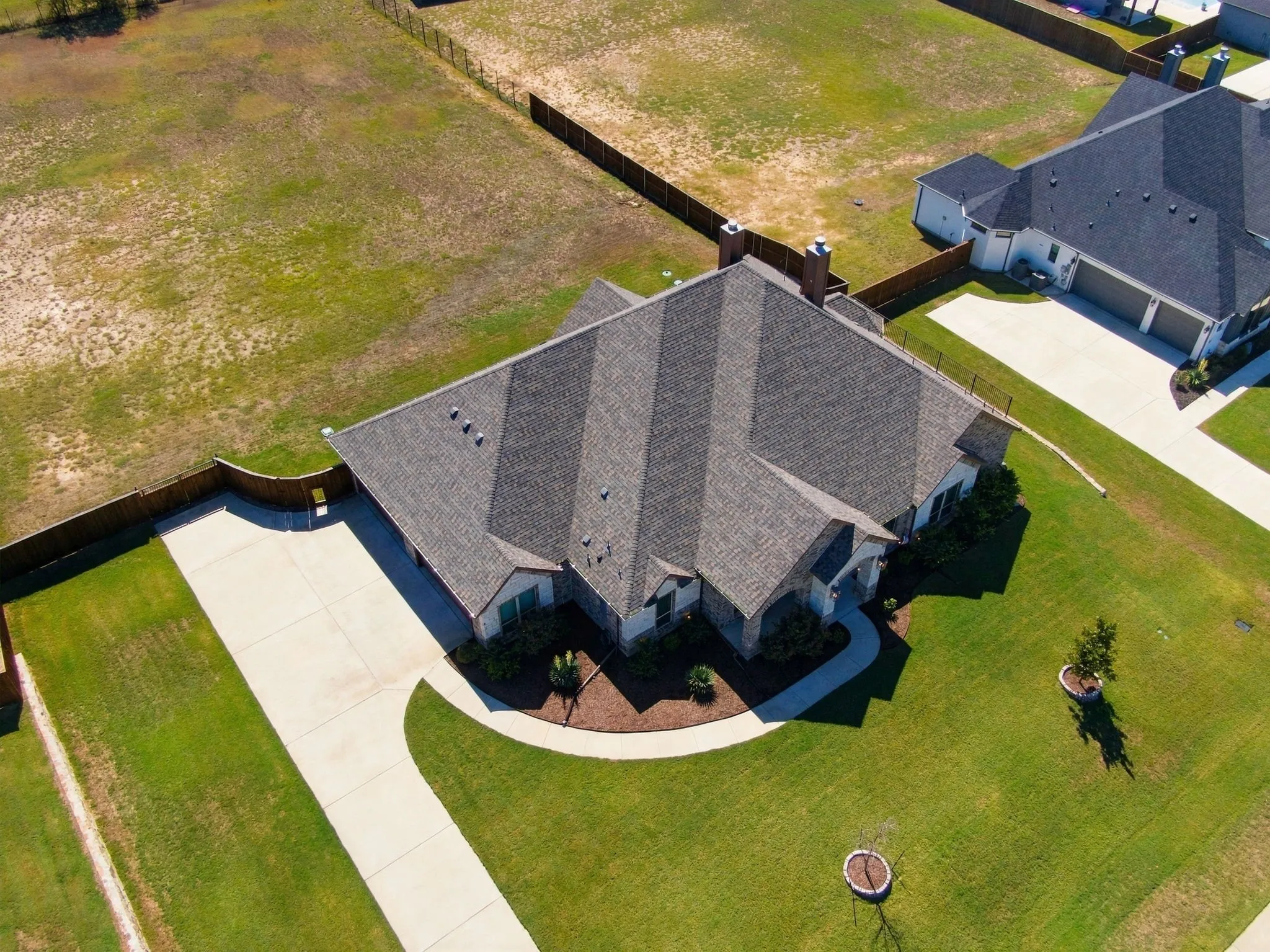 Roof replaced in 2025 with class 4 impact resistant shingles. Great for our Texas weather