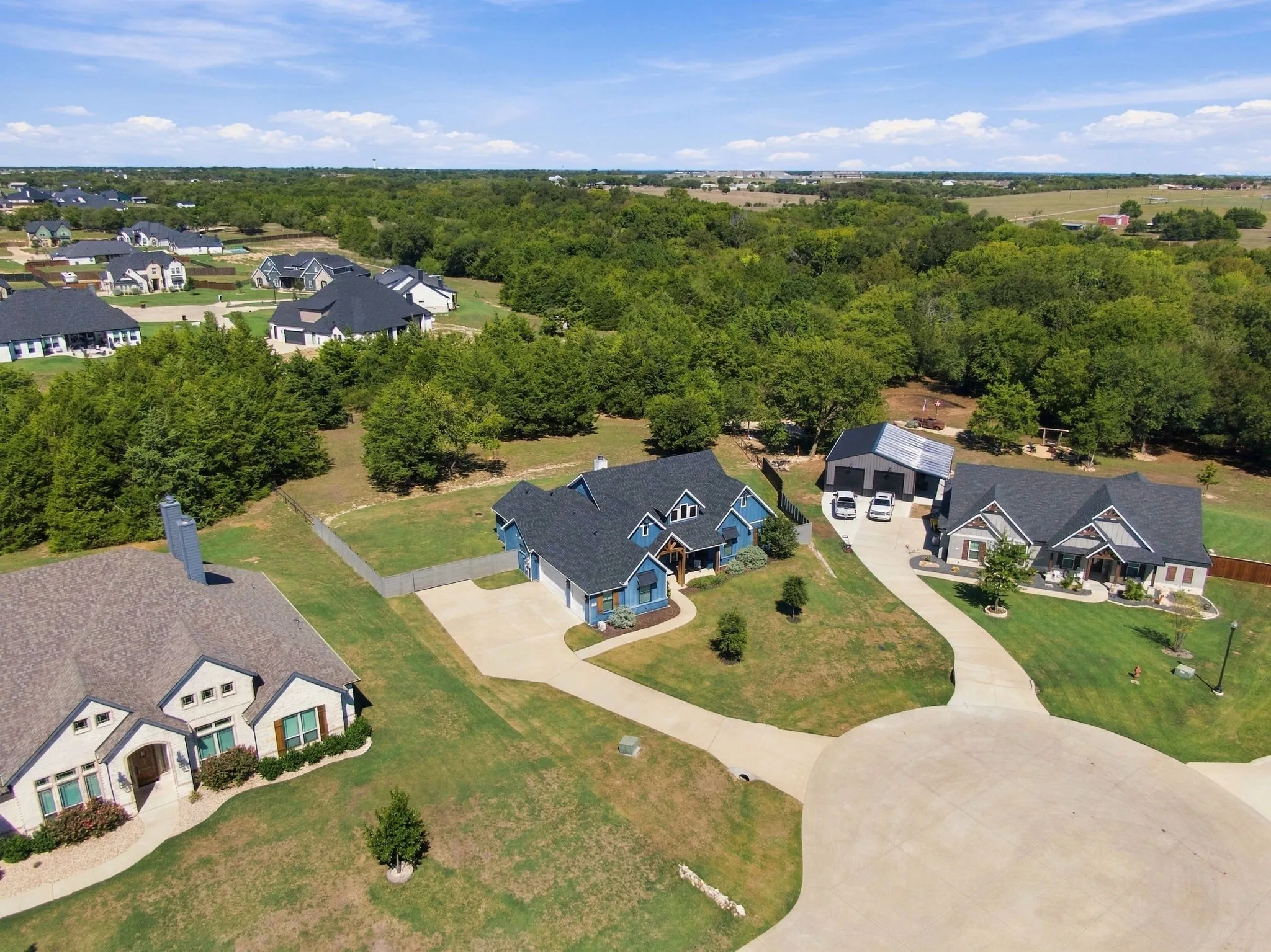 This home is located in a cul-de-sac and from the back porch you have privacy.