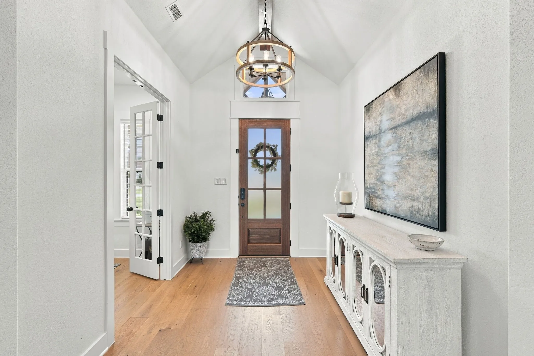 Another view of the foyer and a spot for an entry way table.
