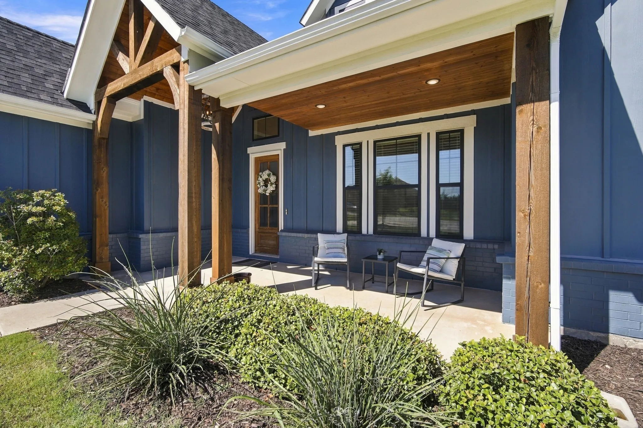 Love a cute front porch! Perfect place for coffee in the mornings.