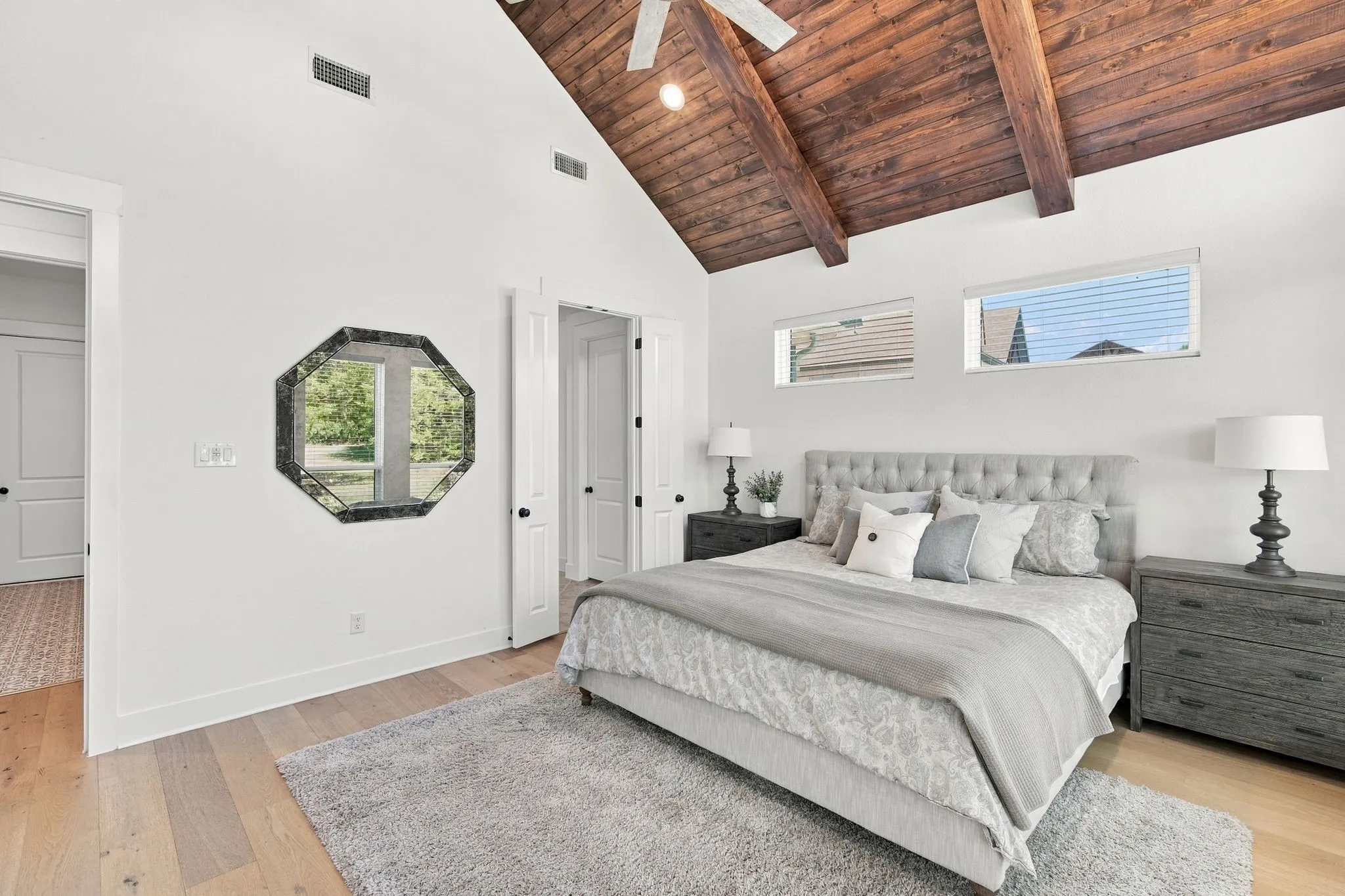 The spacious bedroom has an ensuite bath.