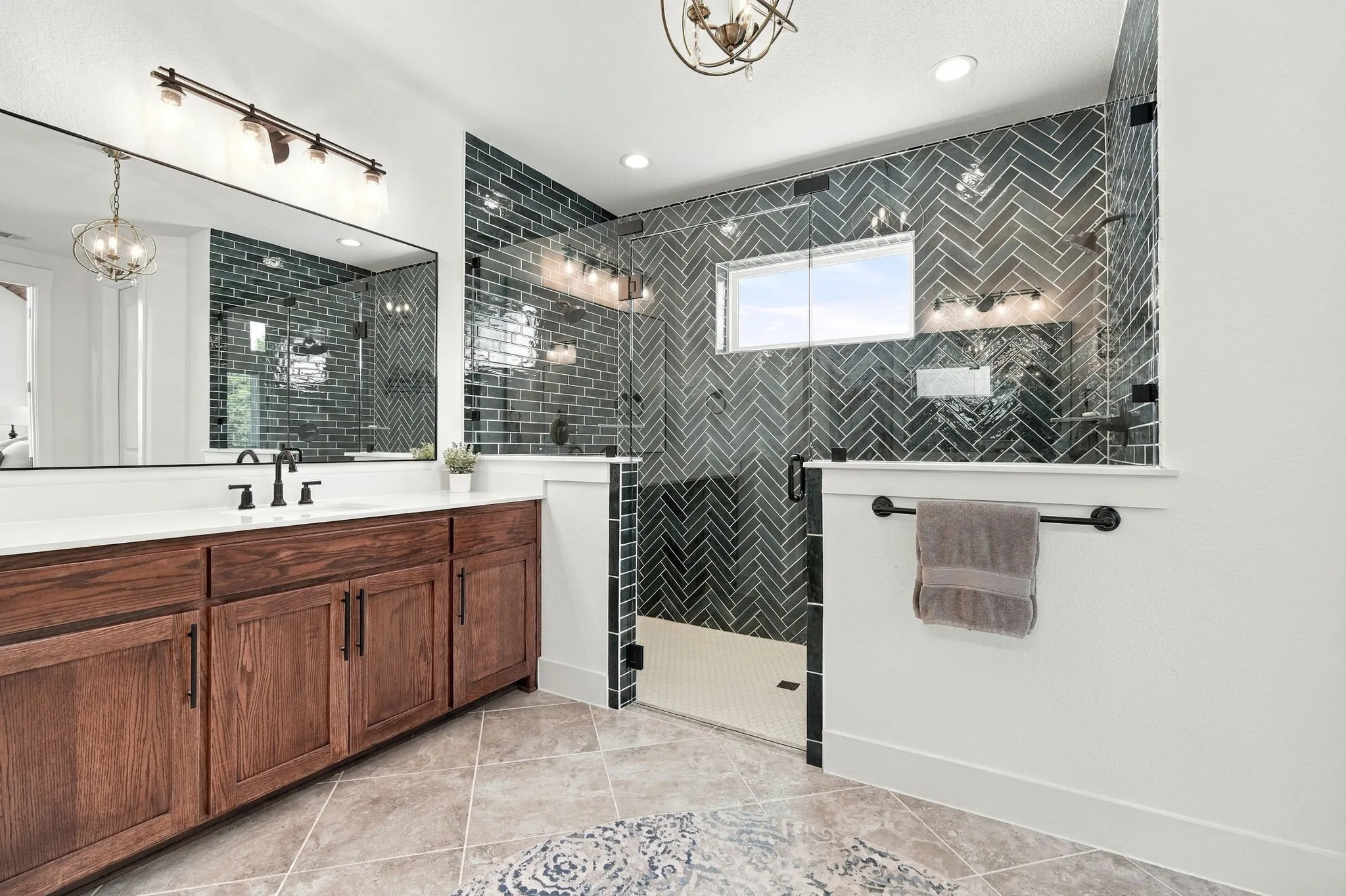 This dual shower really stands out with the pretty color in the herringbone pattern.