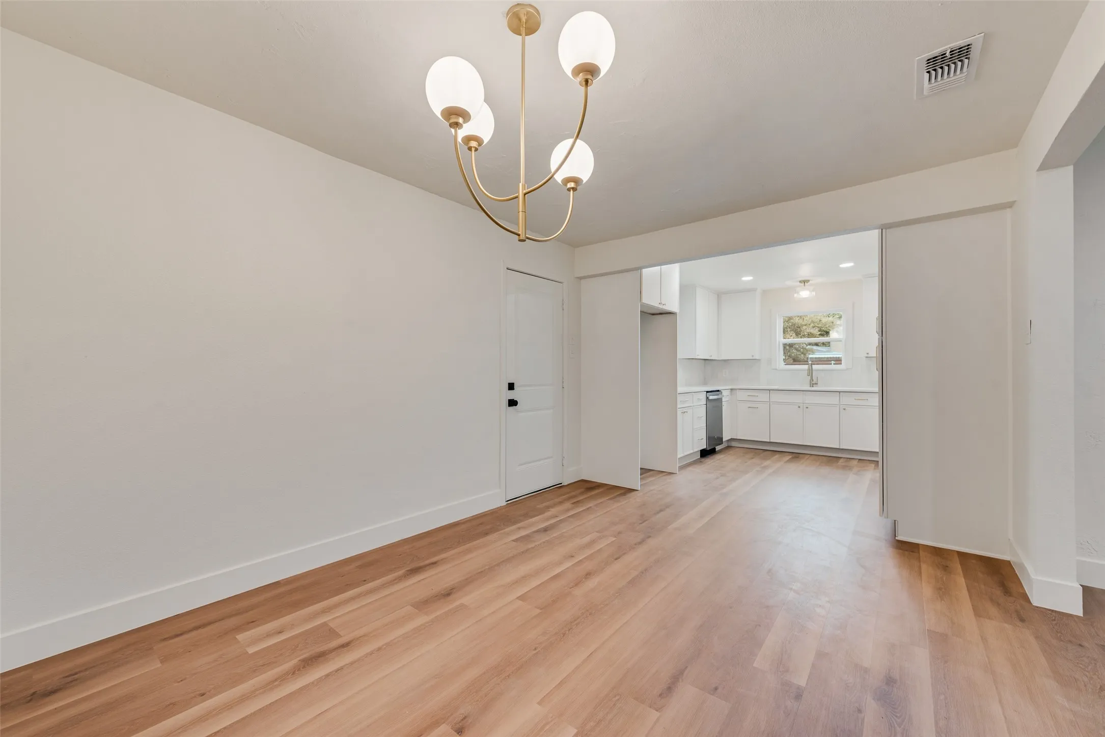 Open dining area with seamless kitchen access.