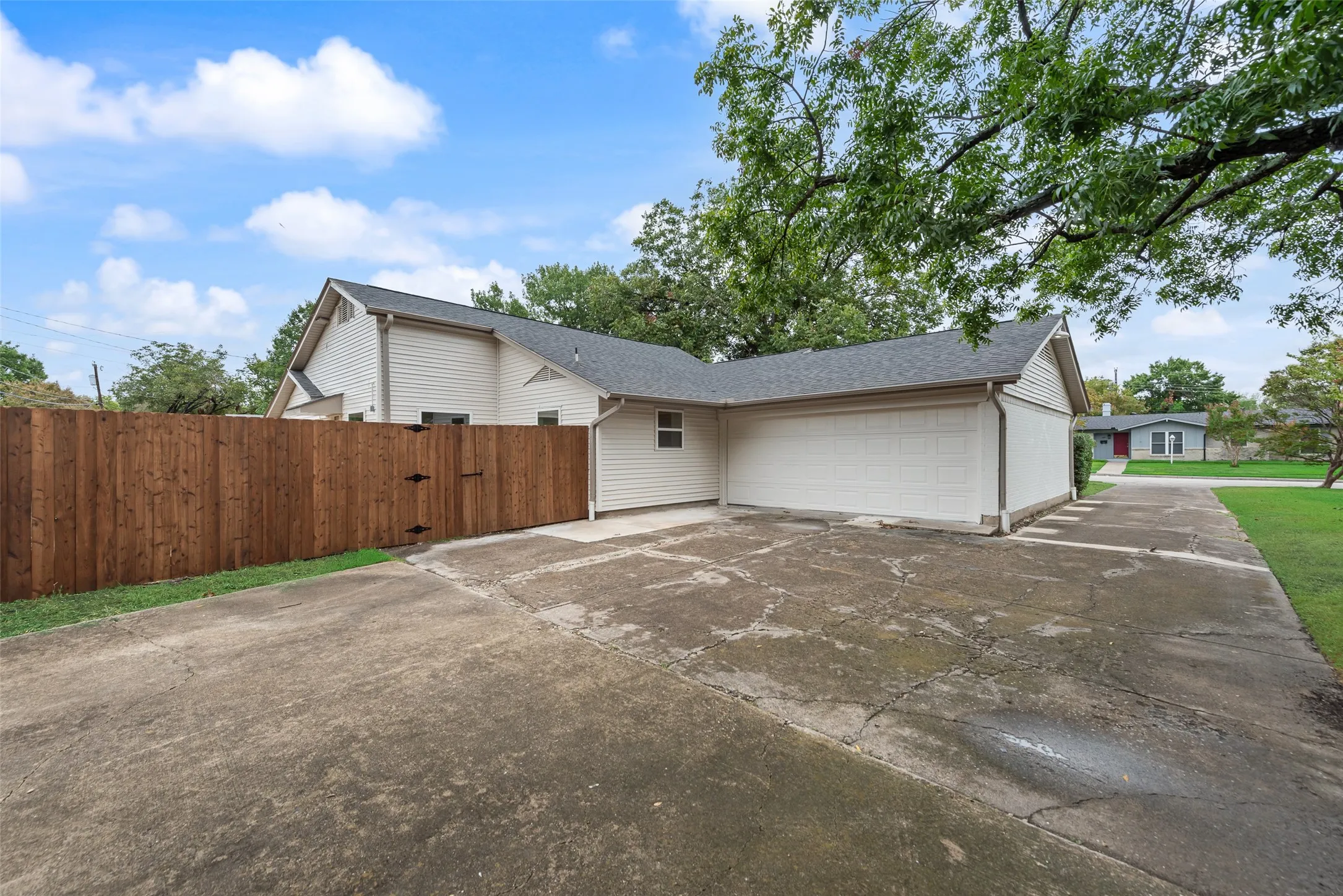 Two-car garage with convenient rear driveway access.