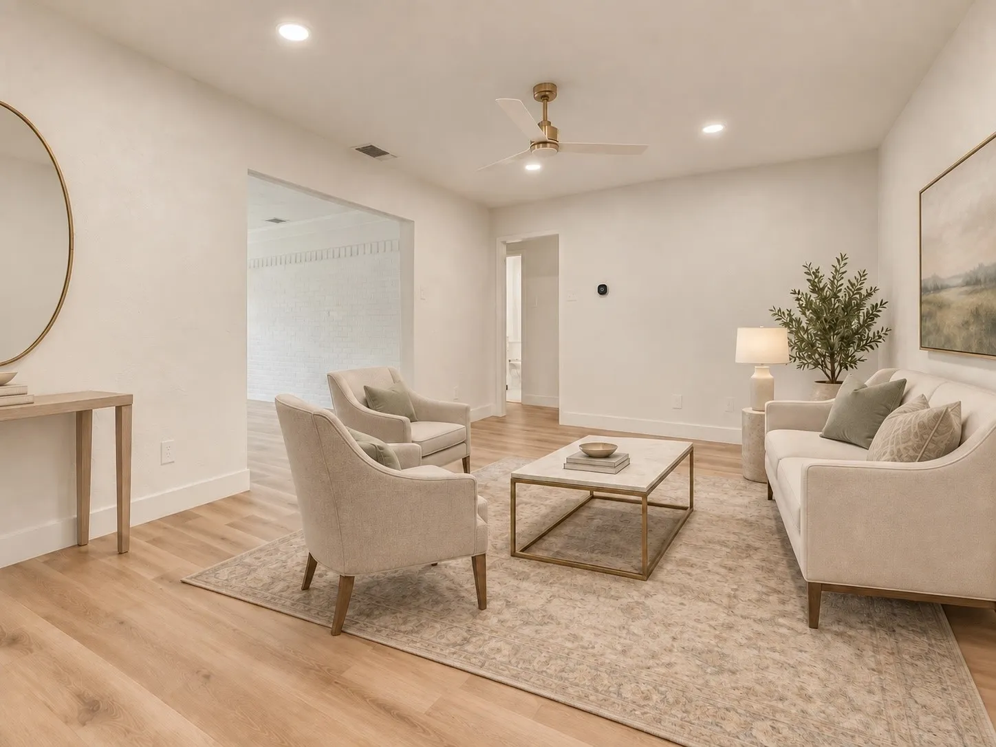 Virtually staged living room showcases flexible seating and entertaining space.