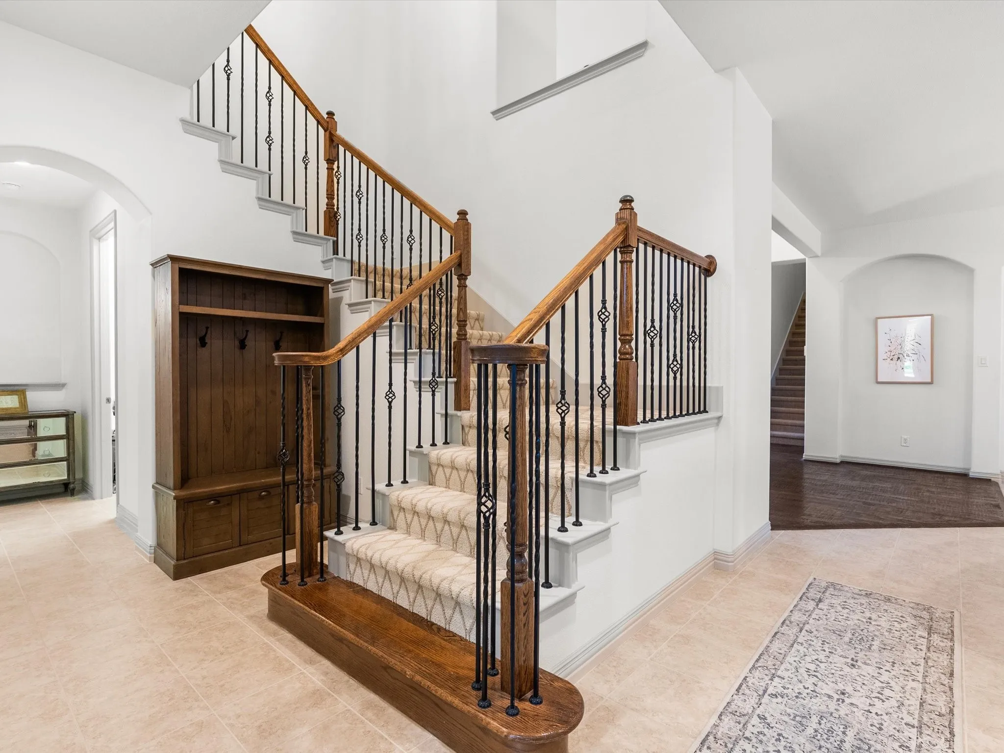 Front staircase leading to the second level