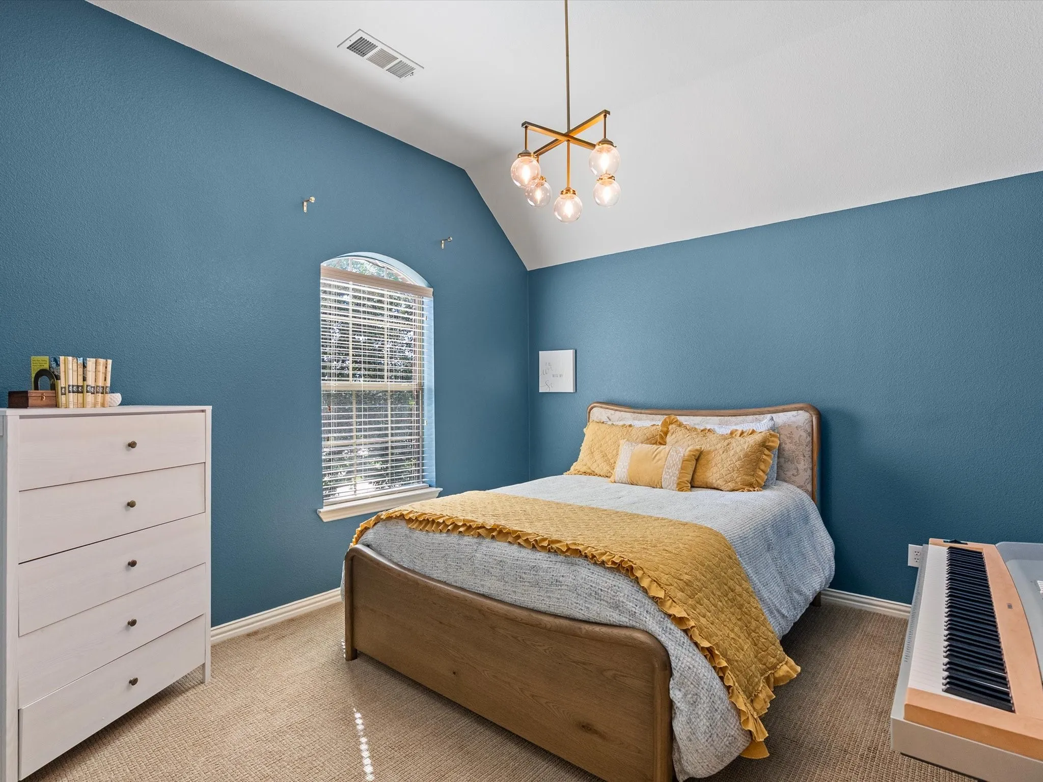 Secondary upstairs bedroom with upgraded lighting