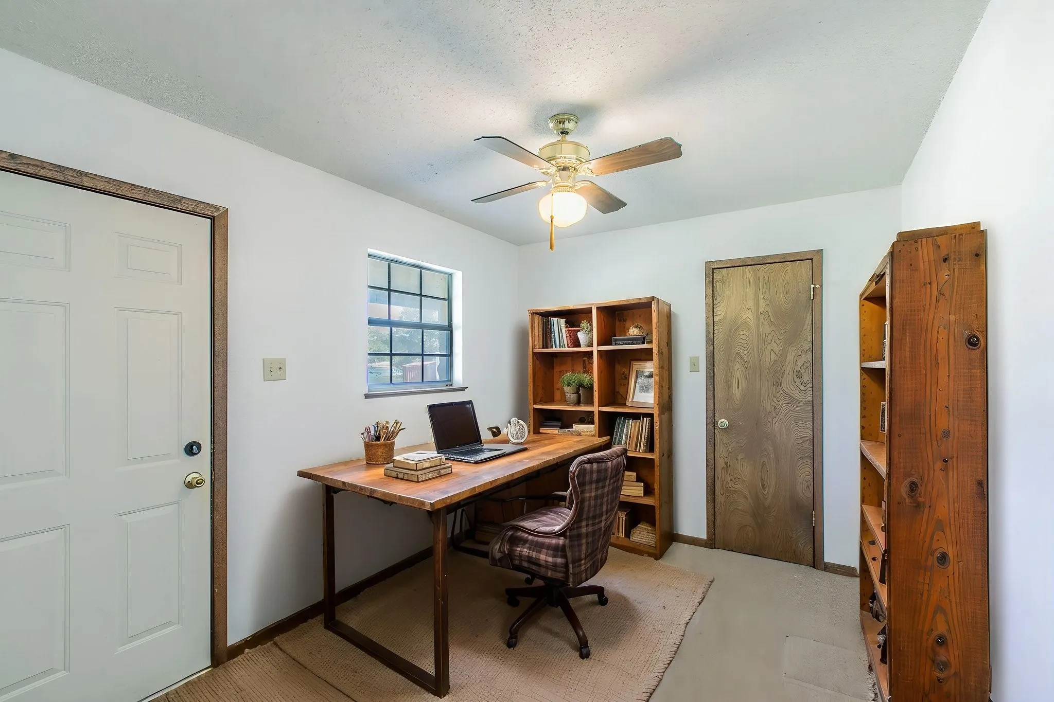 Complete with a large walk in closet and outside entrance this can be a small 4th bedroom or an efficient office.