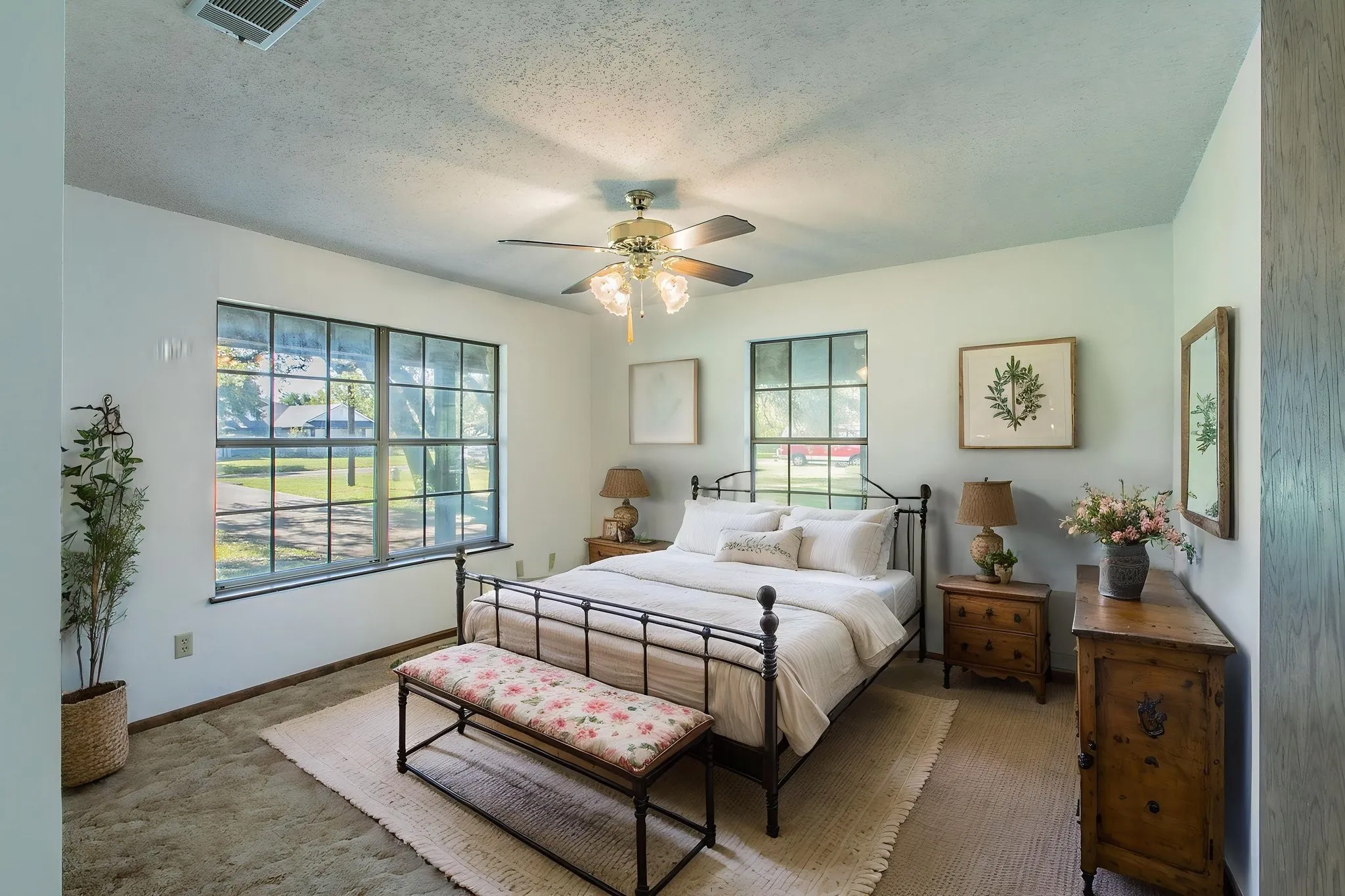 Window with grid panes,  and a ceiling fan with light fixture