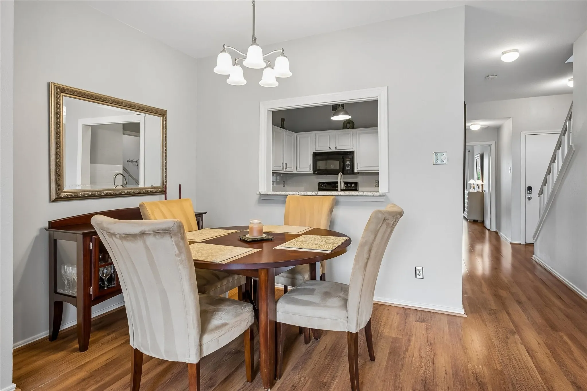 Large closet under stairs & laundry room down hallway off kitchen