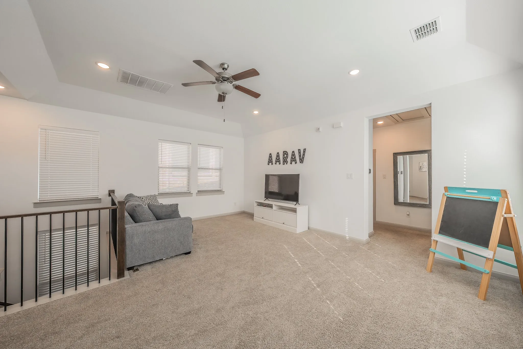Large second floor loft offers versatile space
