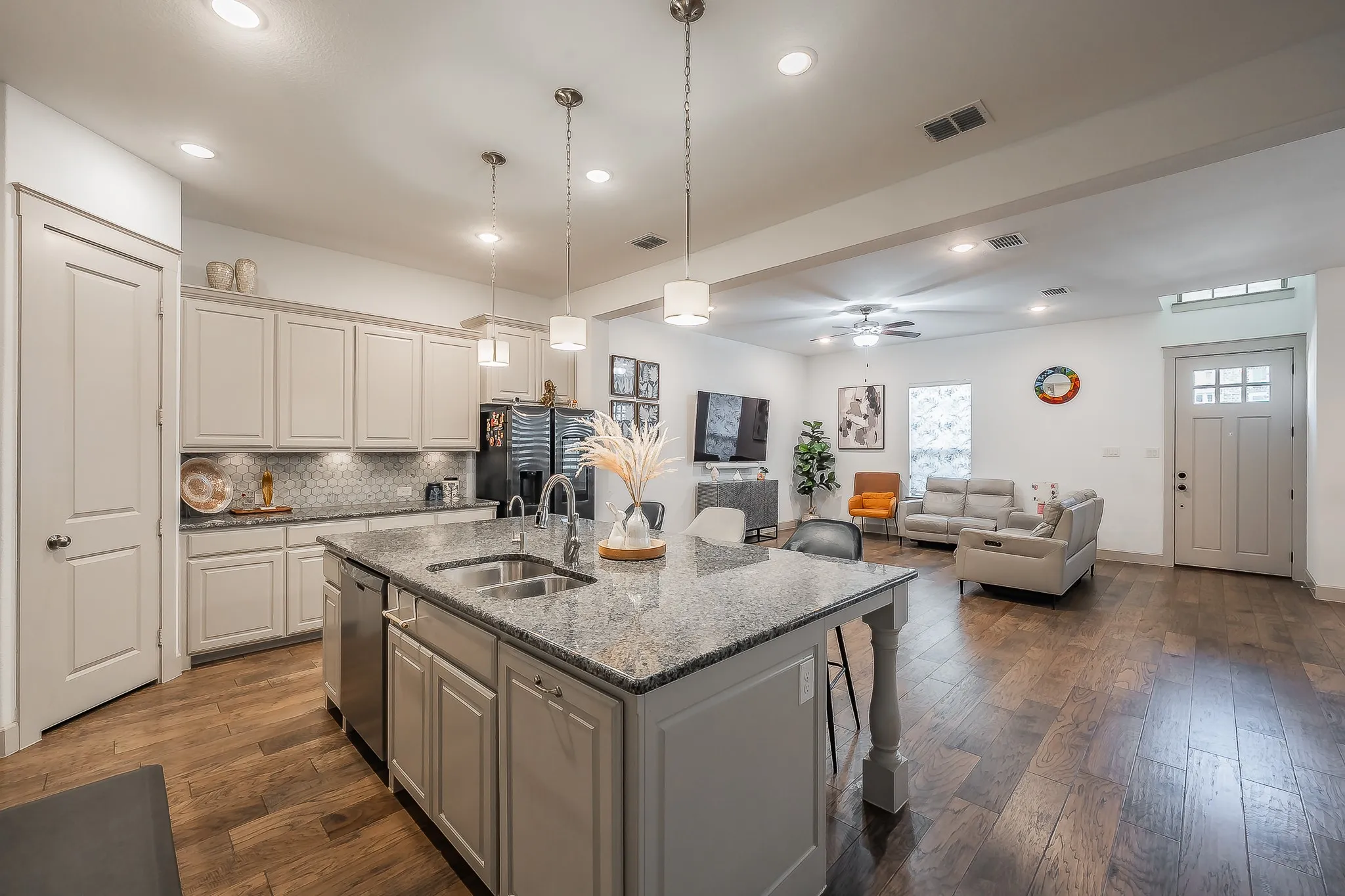 Kitchen opens up to the living room, perfect for entertaining guests