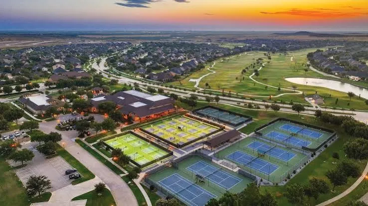 The Cimarron Sports Club at Robson Ranch offers resort-style fitness and recreation, featuring indoor swimming, fitness facilities, and spaces designed for an active lifestyle.