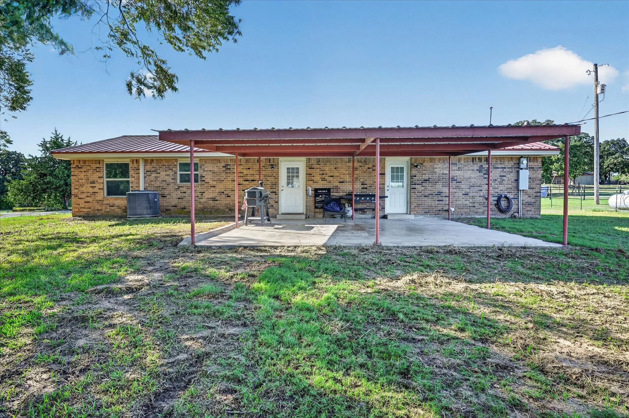 Brick exterior with a metal roof
