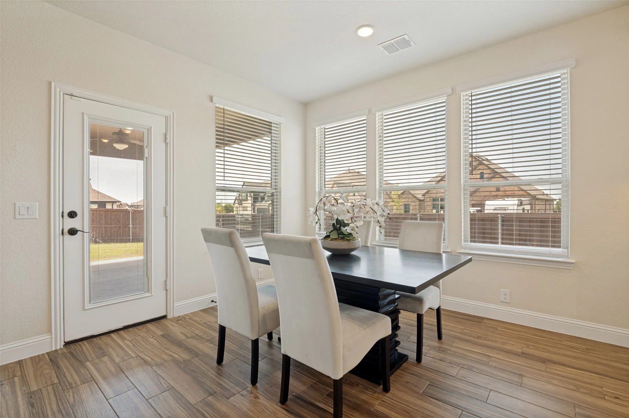 Wood-finish flooring throughout