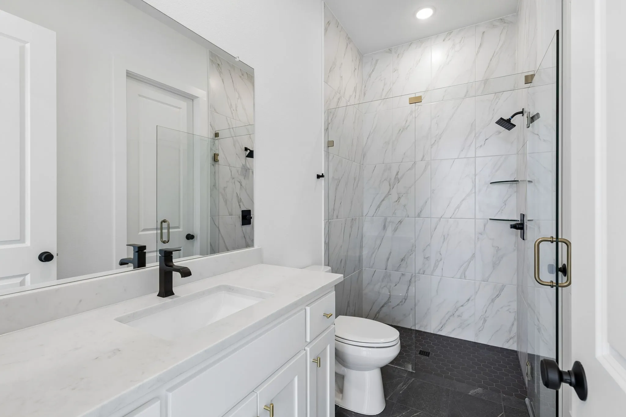 Friends and family will feel right at home in any of the beautifully finished guest baths this dream home has to offer!