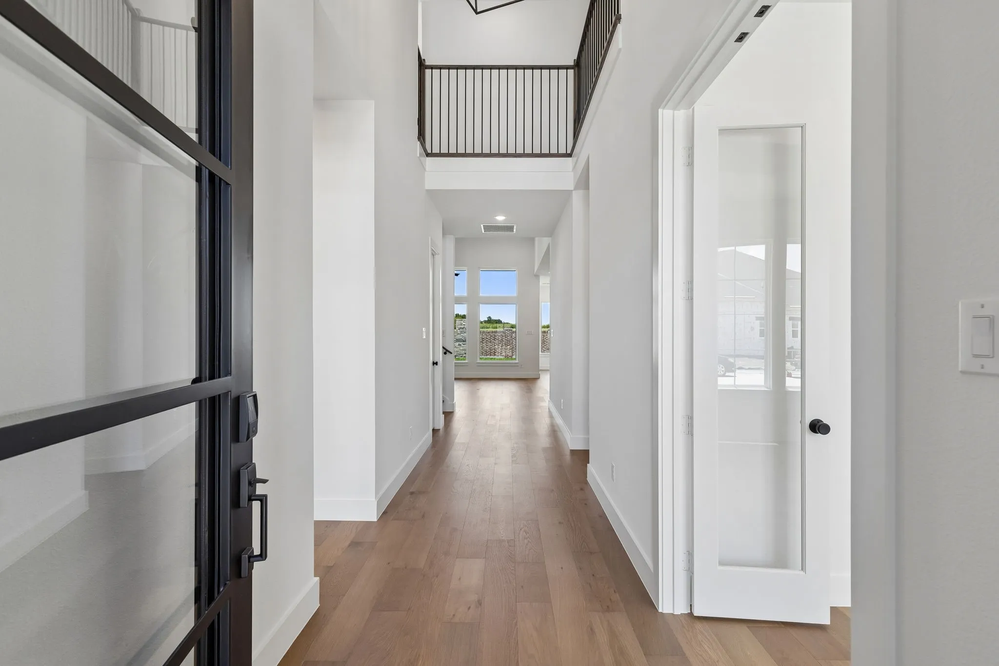 Featuring a modern four panel glass front door, high ceilings and sight lines from the front through to the rear of the home, this dream home offers a stunning entrance for to welcome friends and family into your forever home!