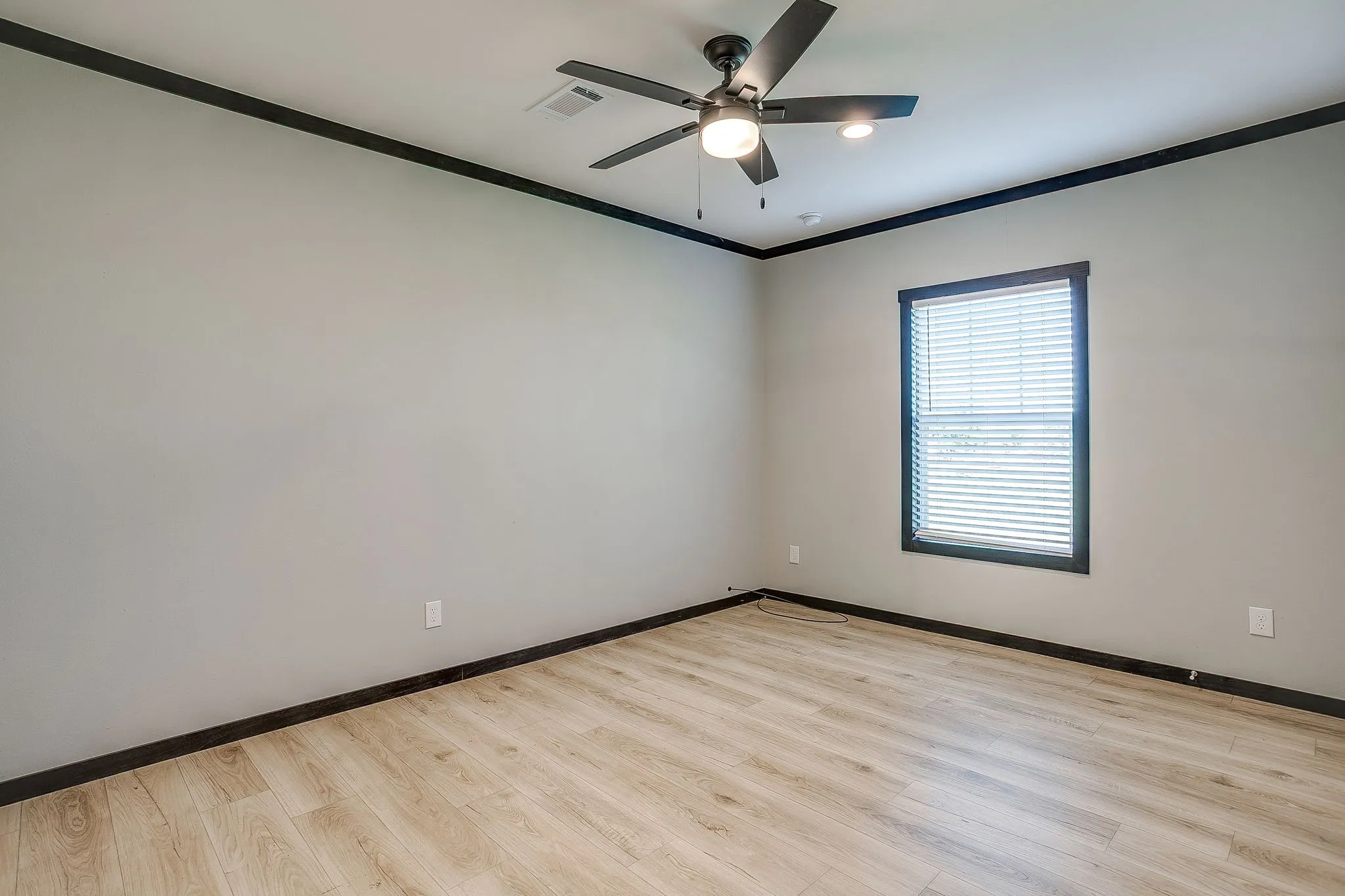 Wood-finish flooring with dark trim