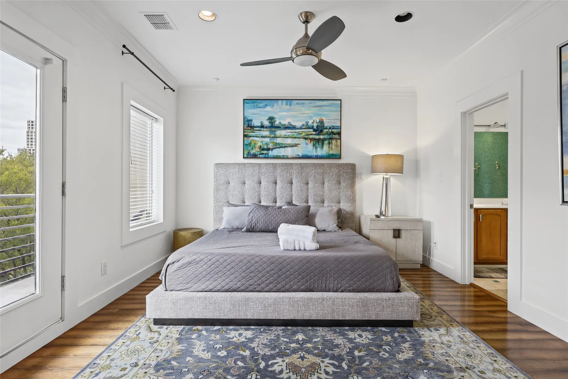 Hardwood flooring, recessed lighting, and a ceiling fan with integrated lighting