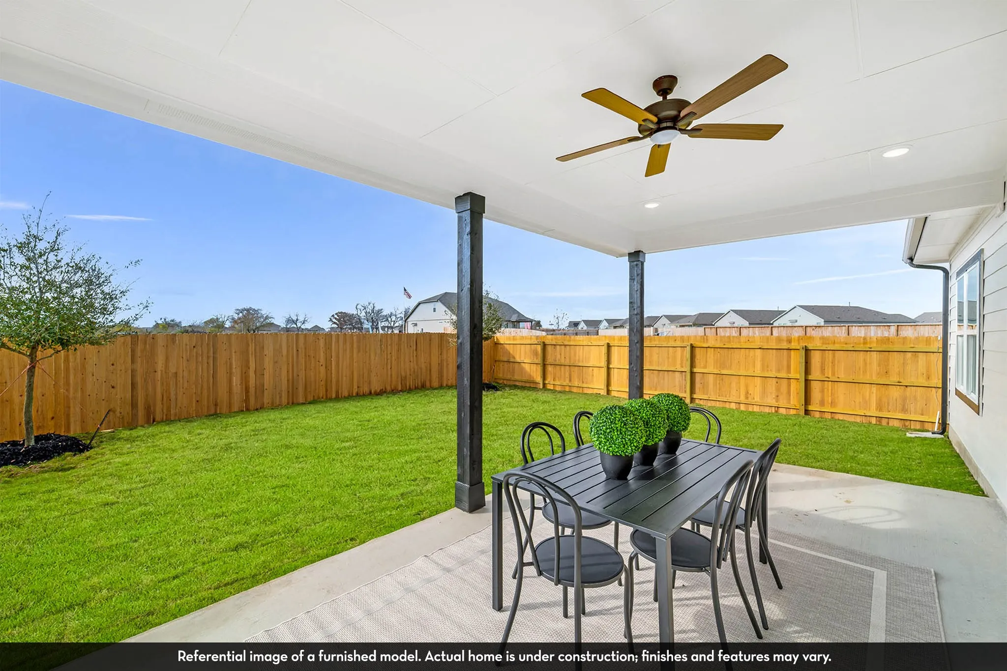 Covered patio with a ceiling fan, recessed lighting, and support columns