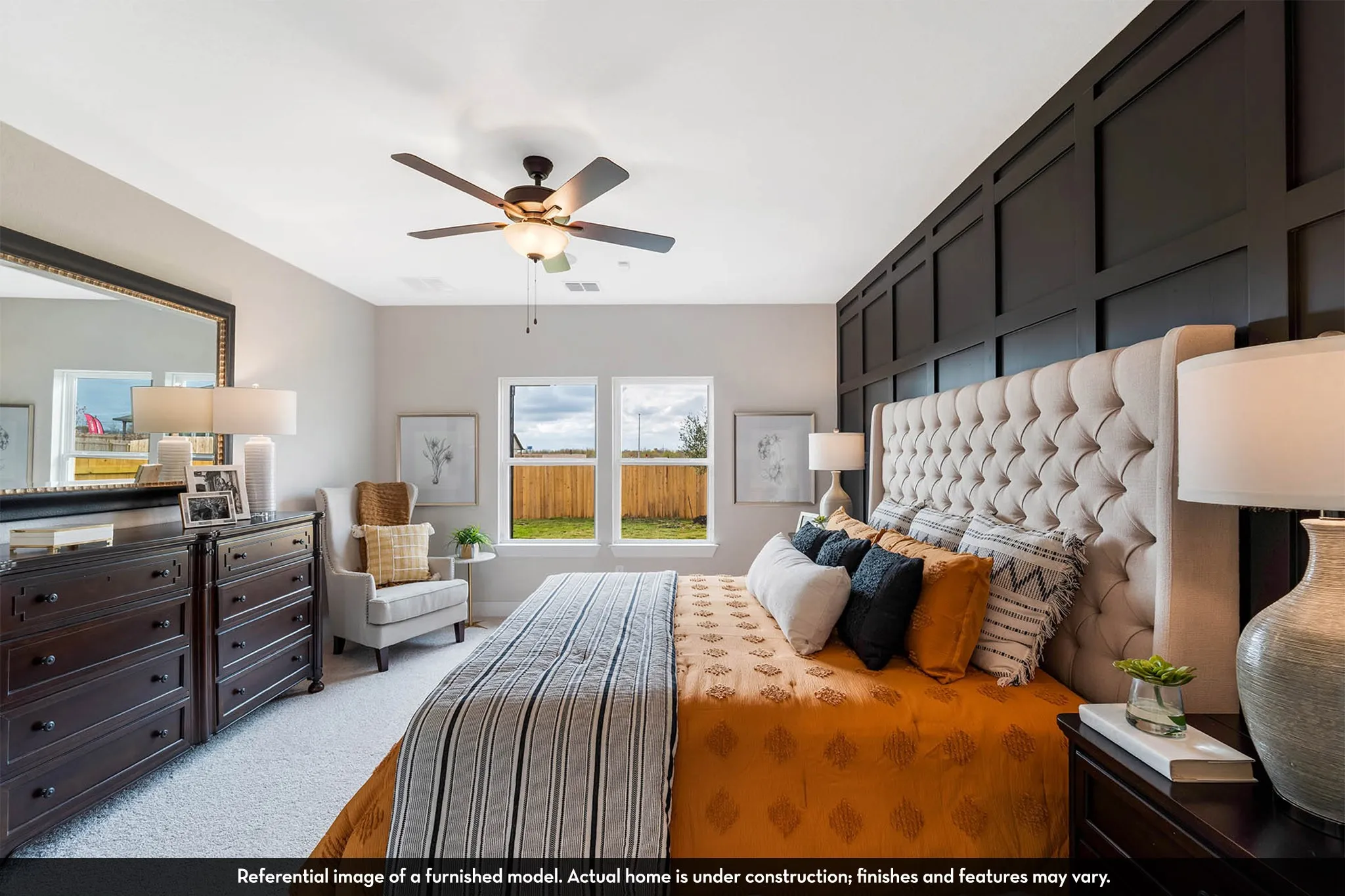 Accent wall featuring dark wainscoting