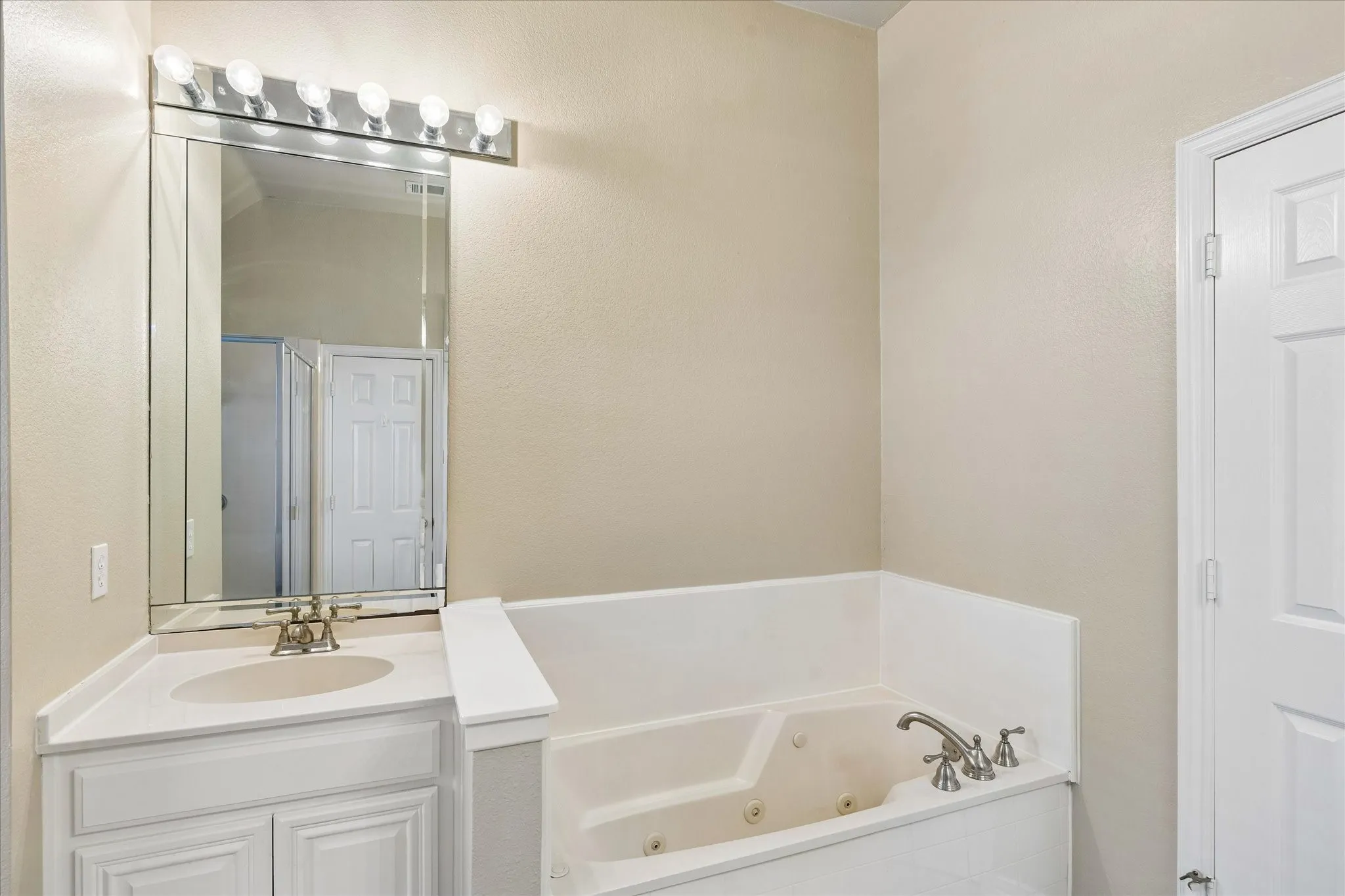 Separate vanities and garden tub