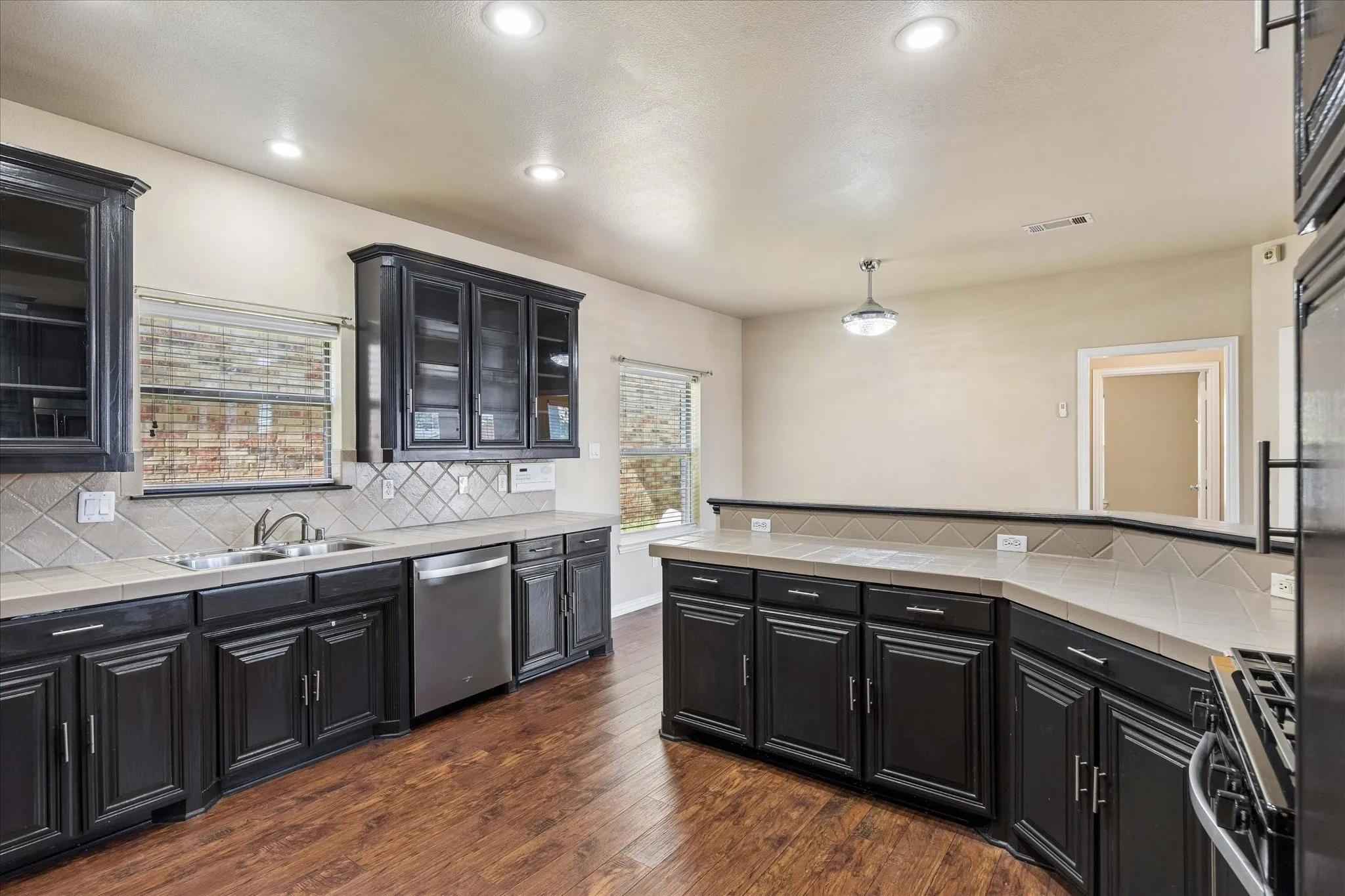 Kitchen with lots of counter and storage space. Easy access to the breakfast room