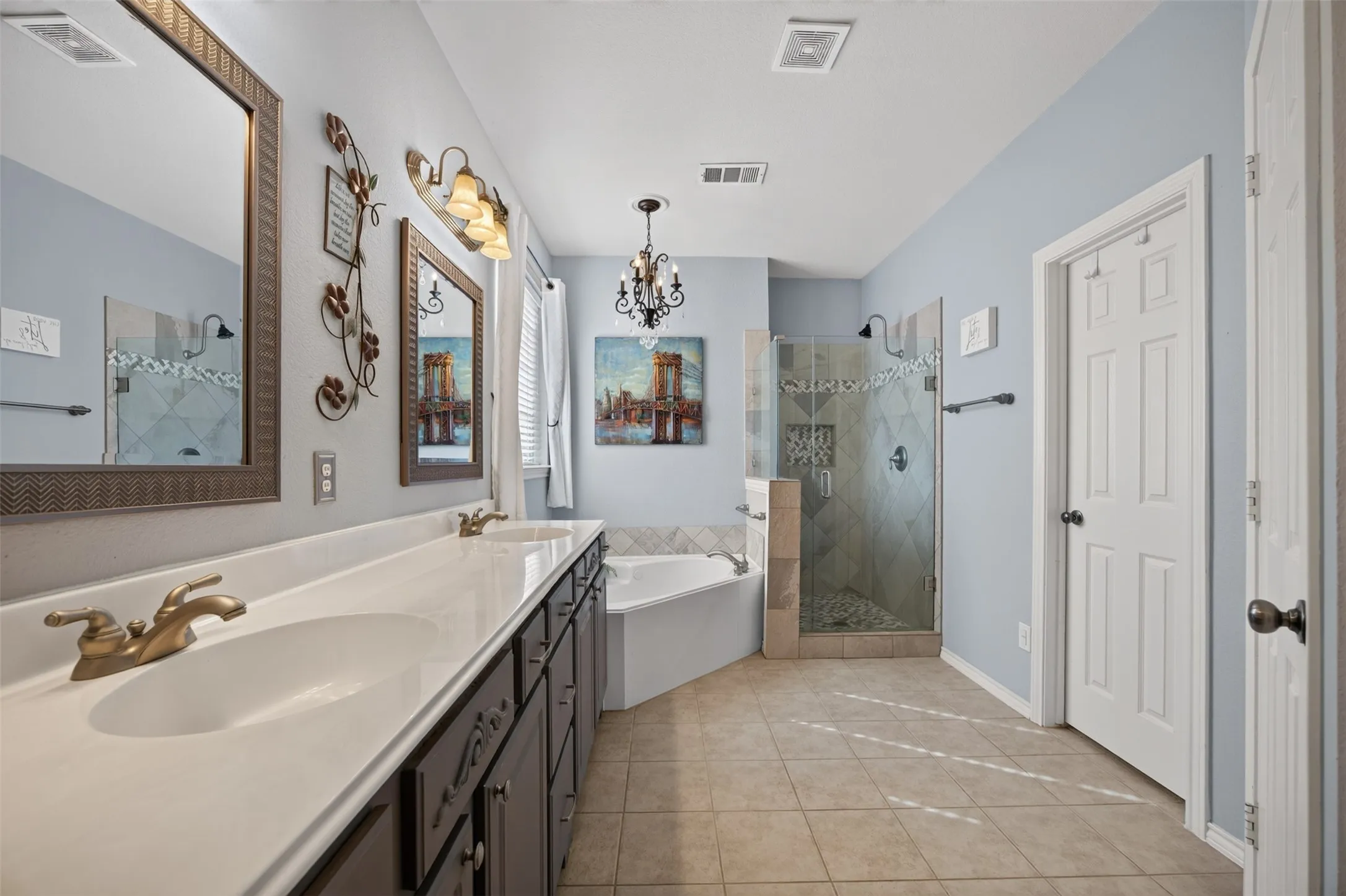 Double vanities, jetted tub, and newly redone walk in shower!
