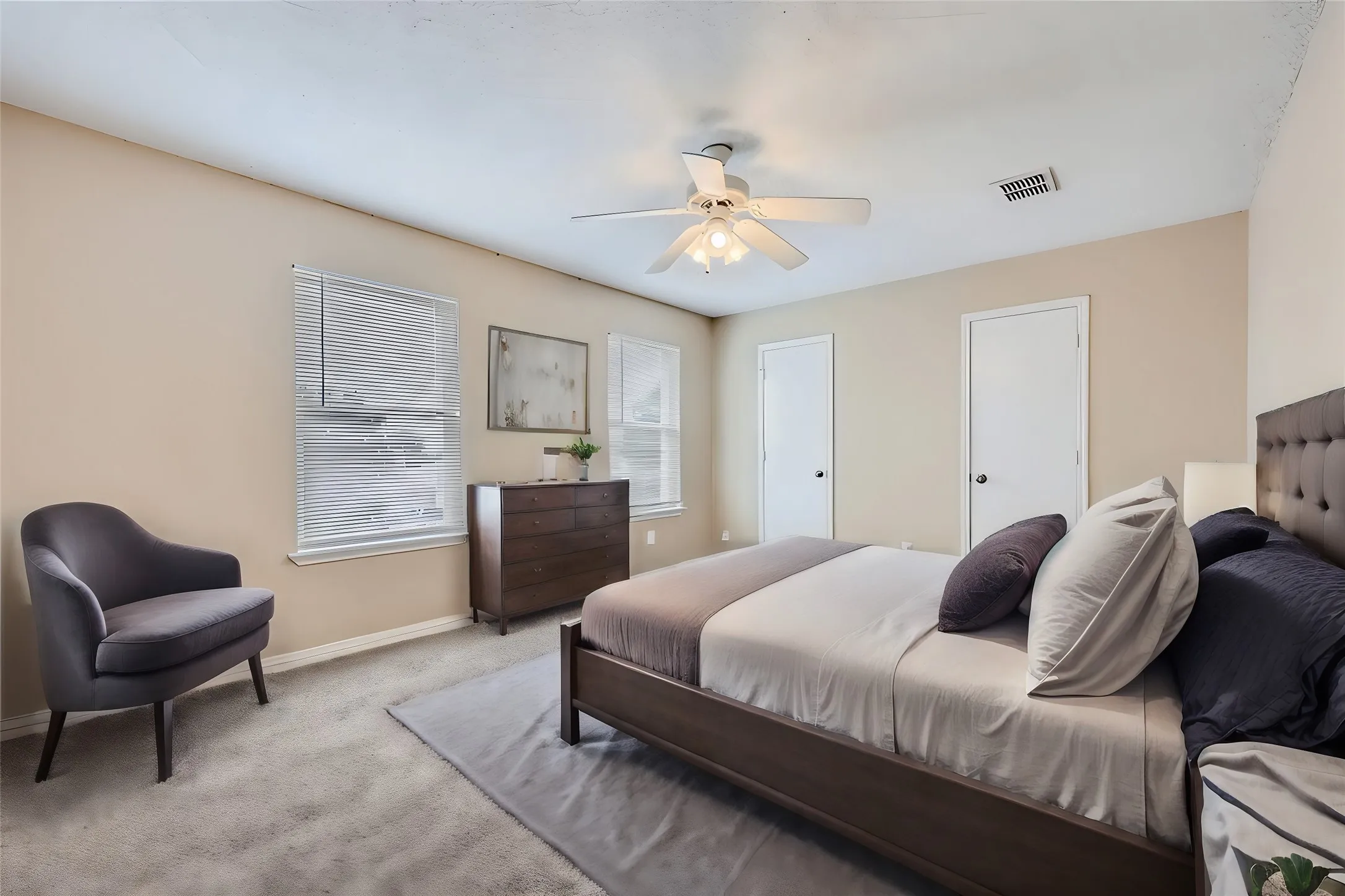 Wall-to-wall carpeting and neutral wall tones