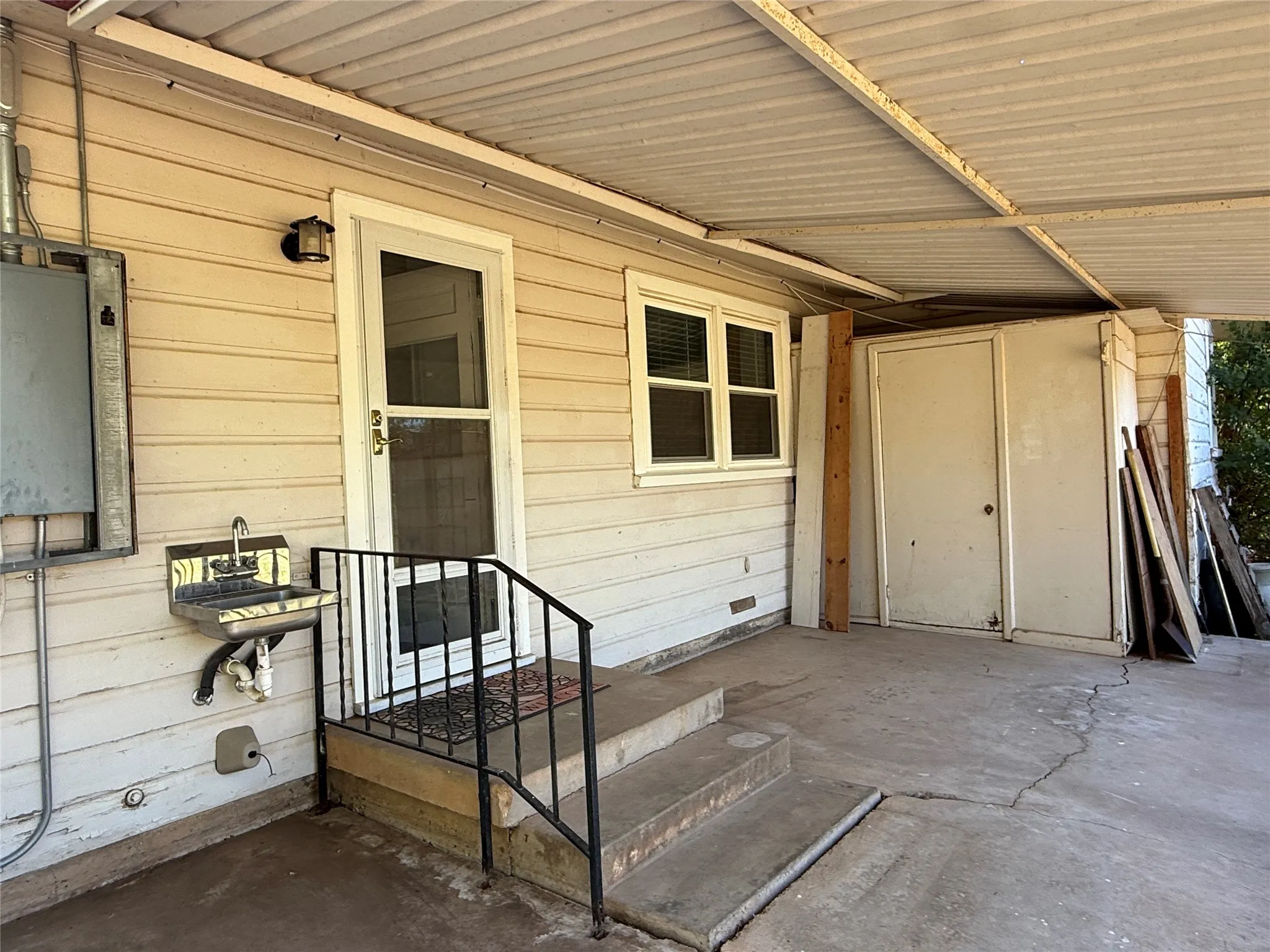 Covered back porch with sink