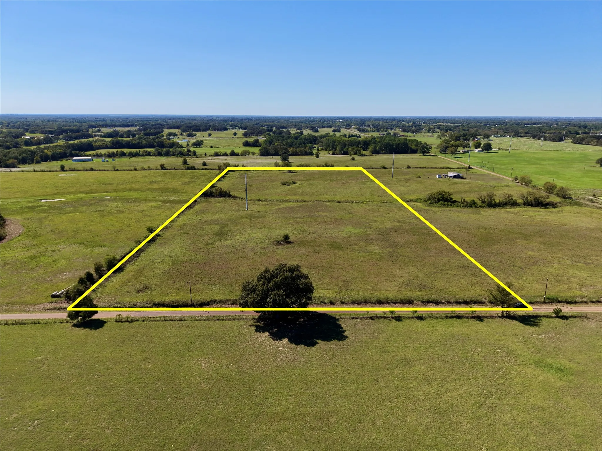 Lower aerial showing the tract from the road; outline is approximate.