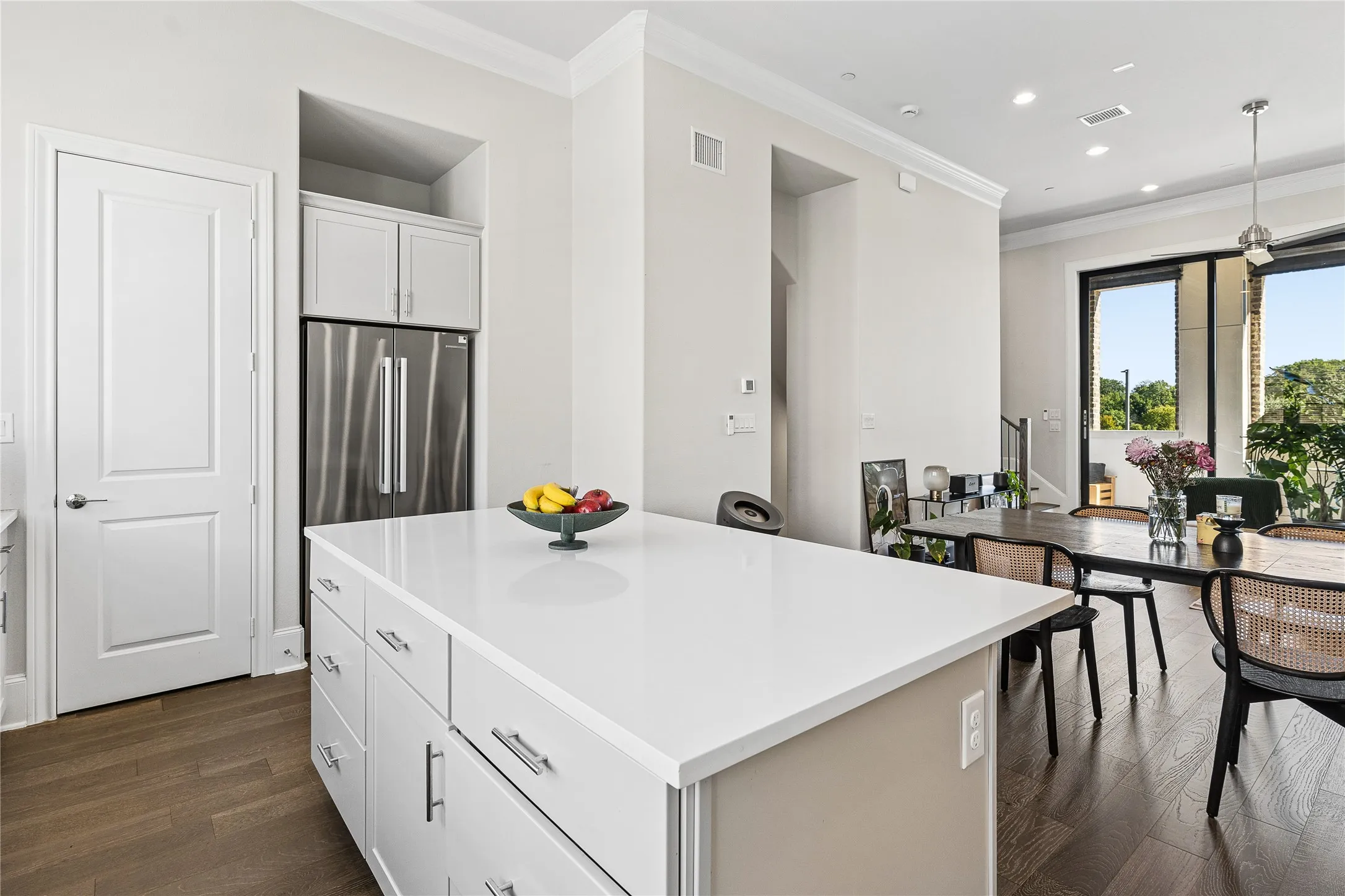 The oversized island provides generous storage, with ceiling prewiring in place for future pendant lighting.