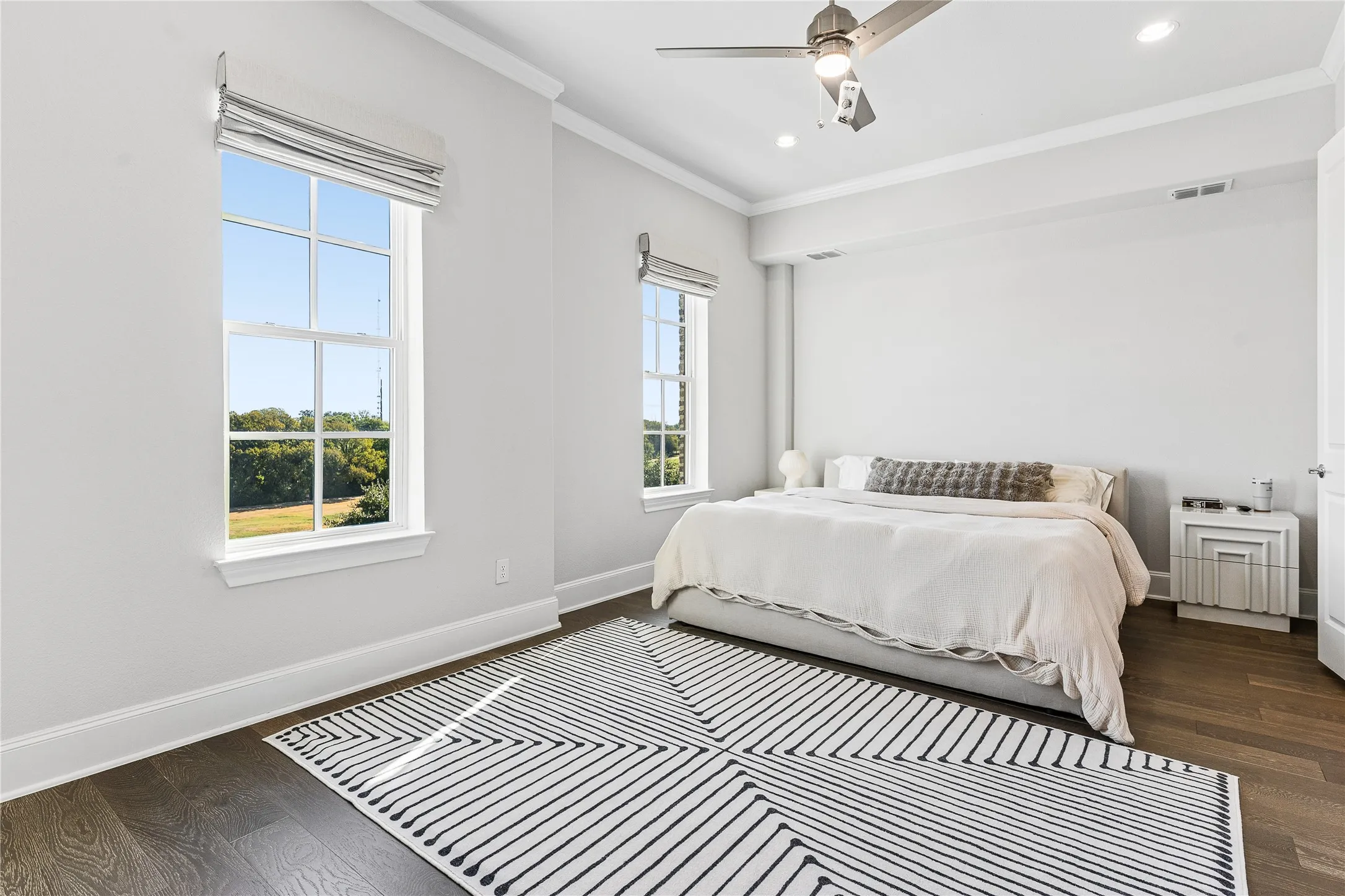 Primary bedroom offers view of Campion Trail.