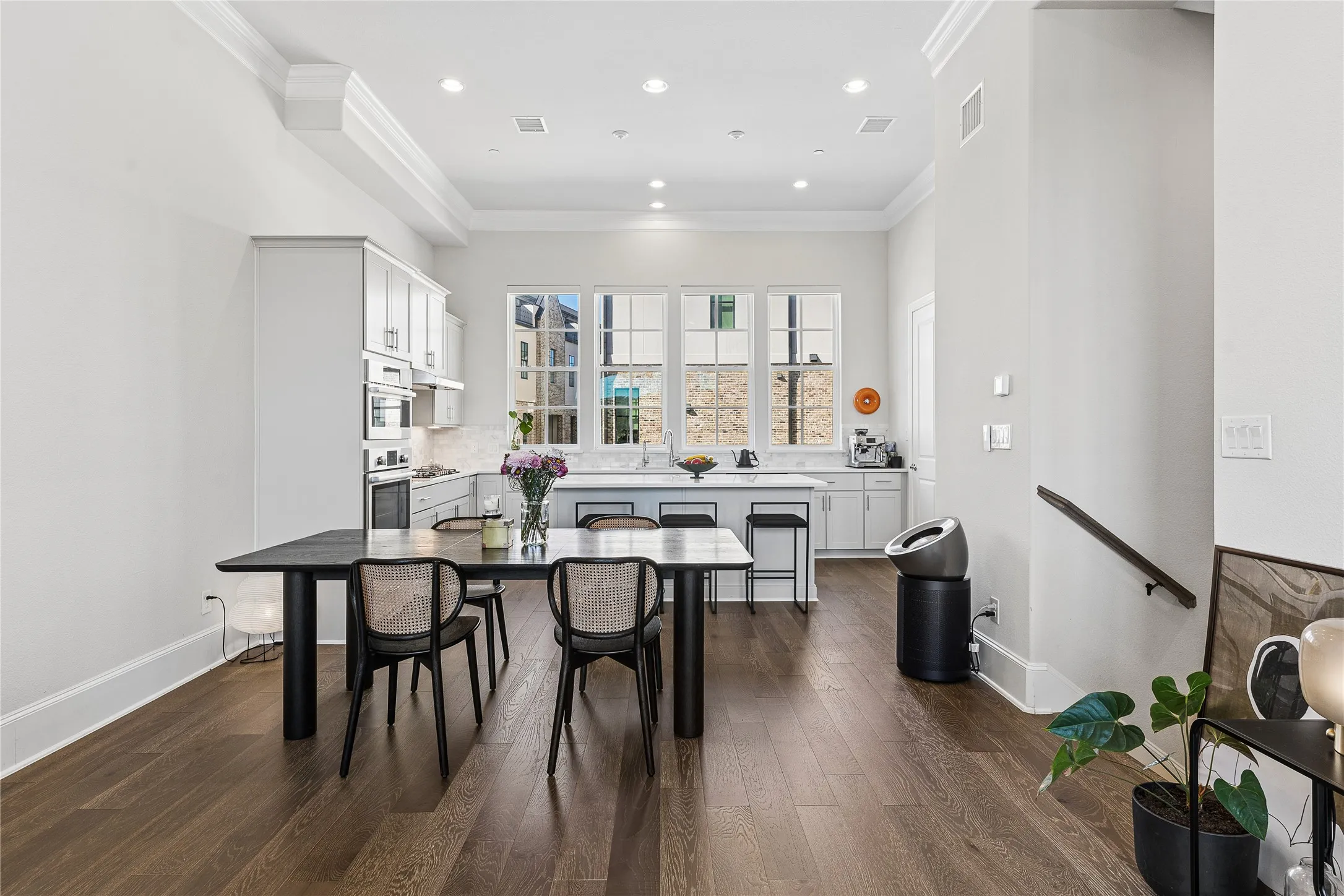 Twelve-foot ceilings and an open floor plan create an airy, spacious main living area.12-foot ceilings and an open floorplan contribute to a sense of space.