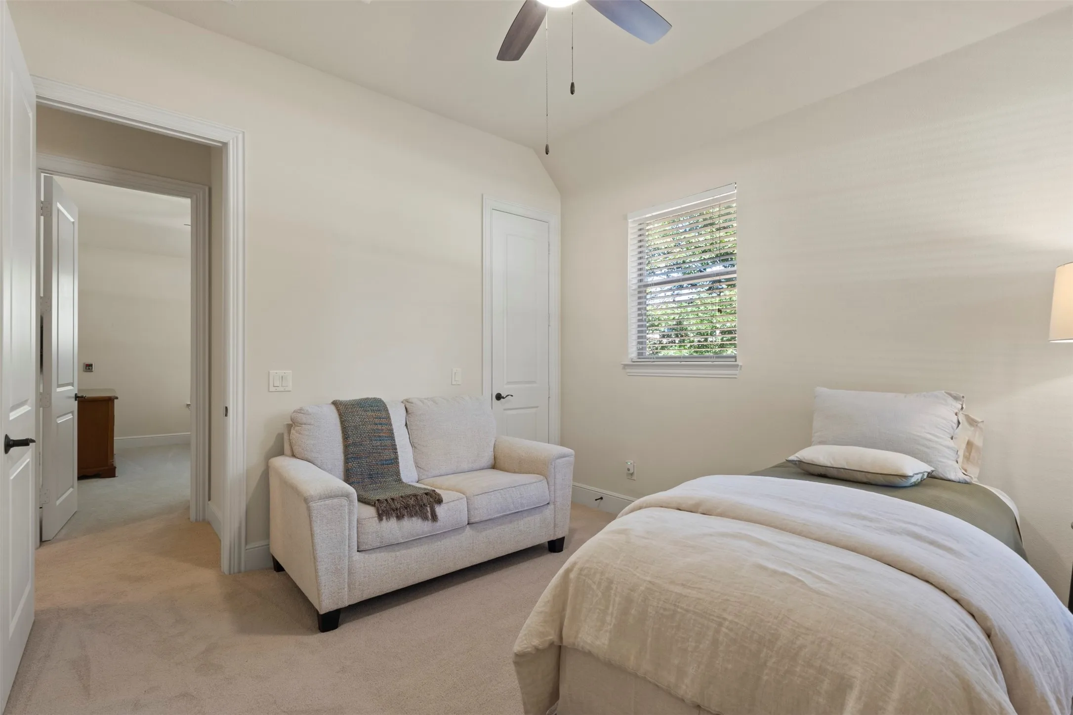 Recessed lighting, ceiling fan, window with blinds, light-colored carpeting, and light-colored wall paint