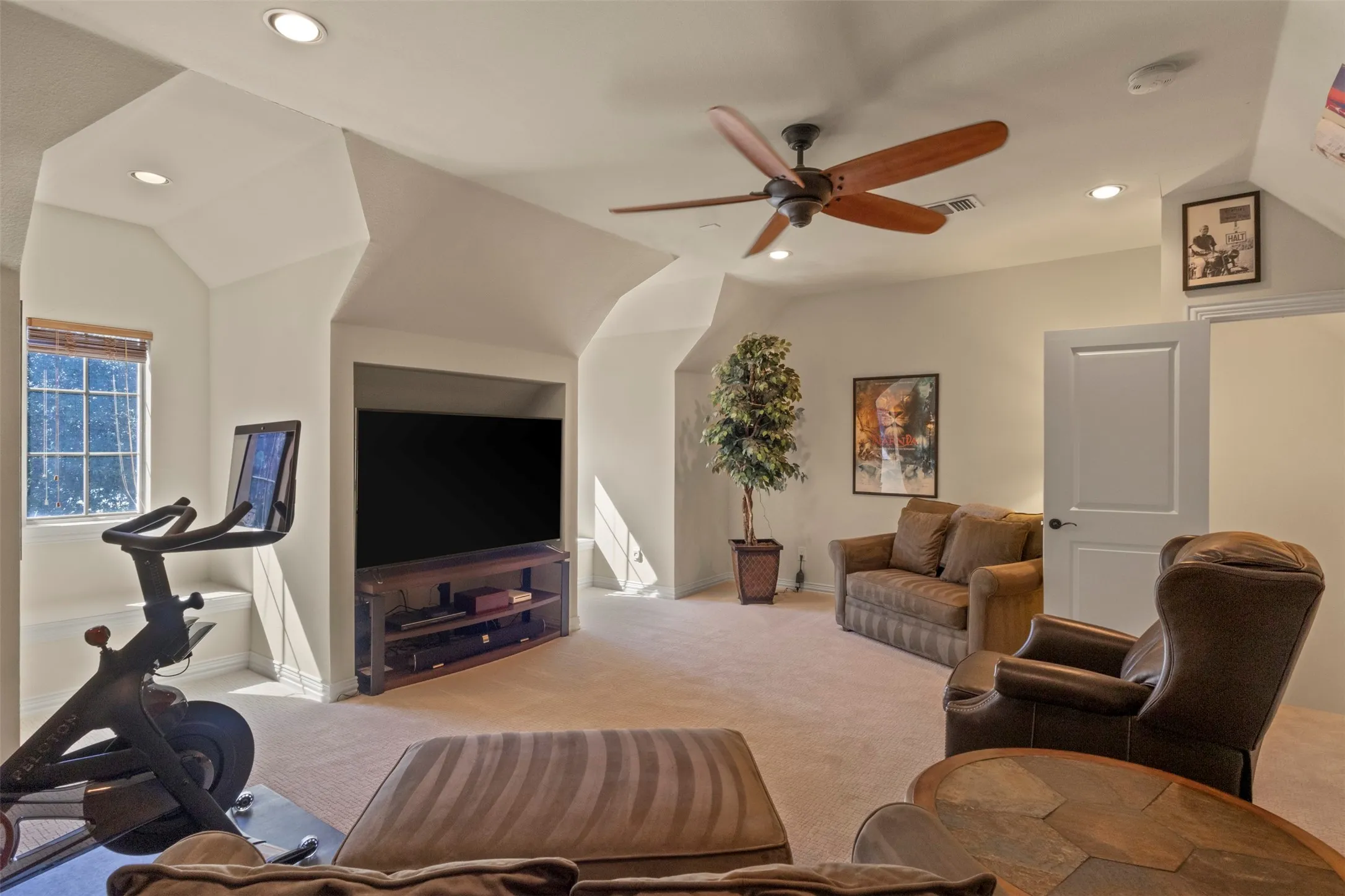 Expansive property featuring a multi-gabled roofline, mature trees, a private swimming pool, and a curved driveway