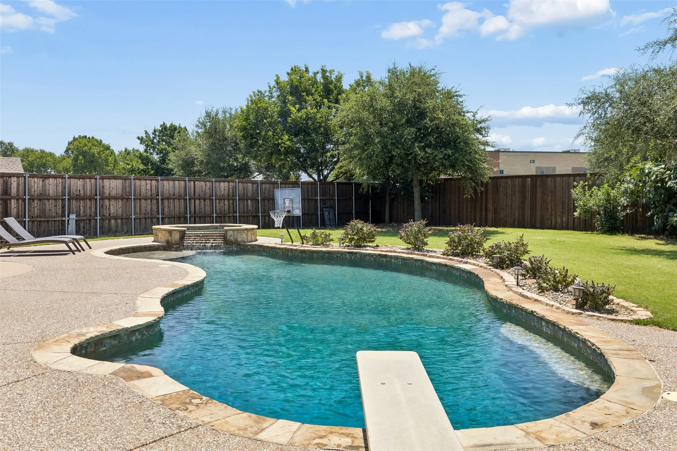 Massive pool view from the diving board side.