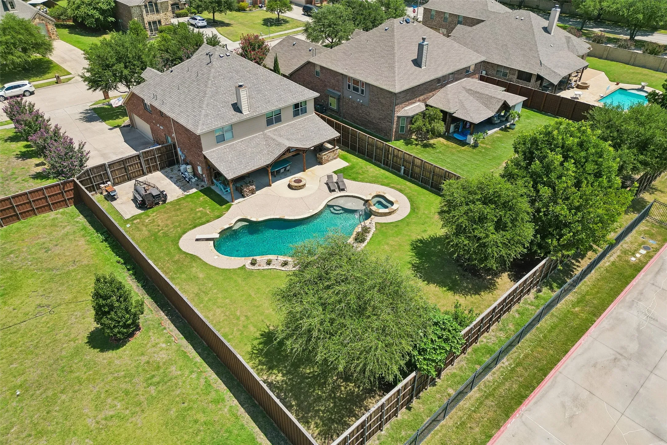 Ample yard space and additional parking behind double gate!