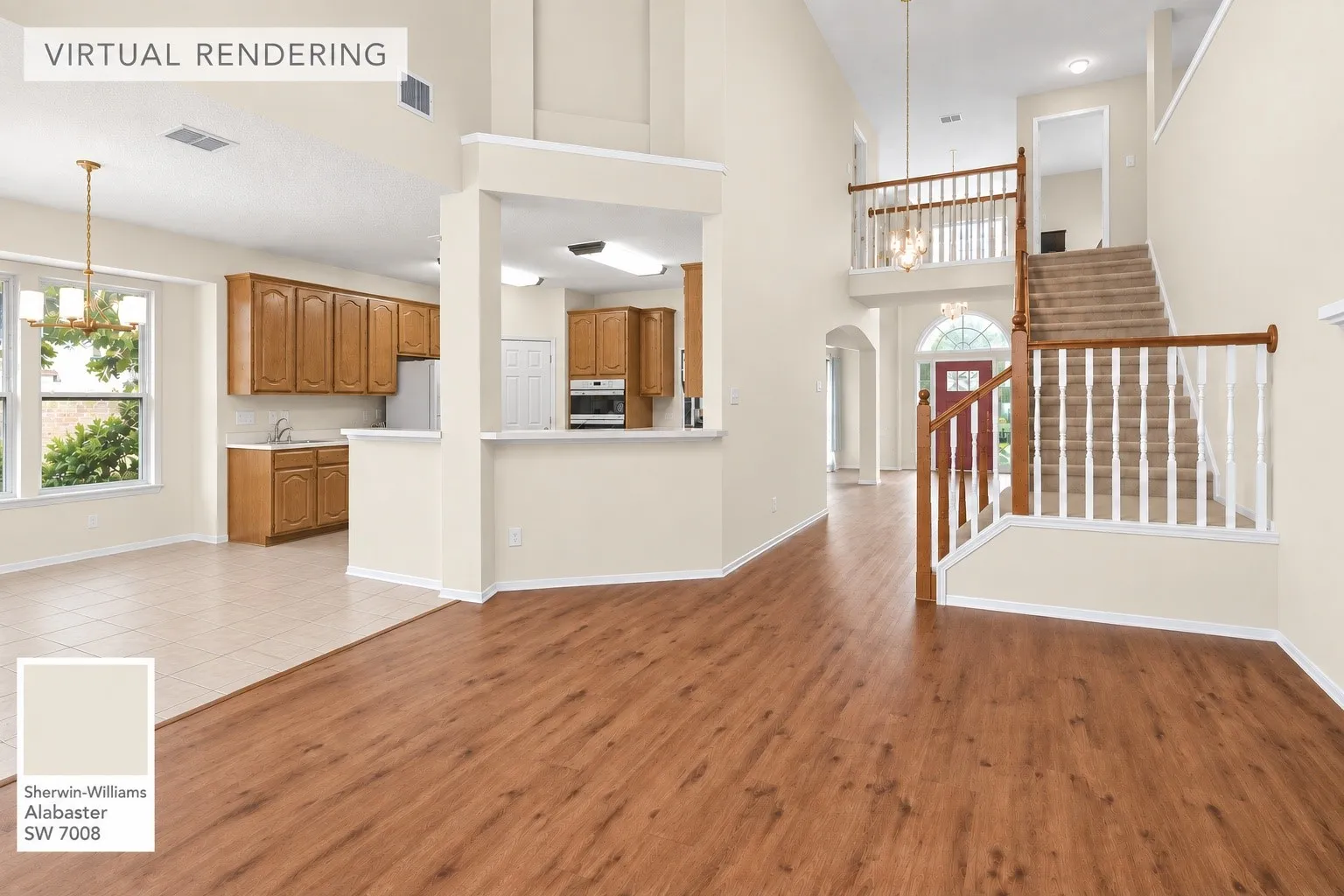Double-height entry with a staircase featuring wood railings and carpeted treads