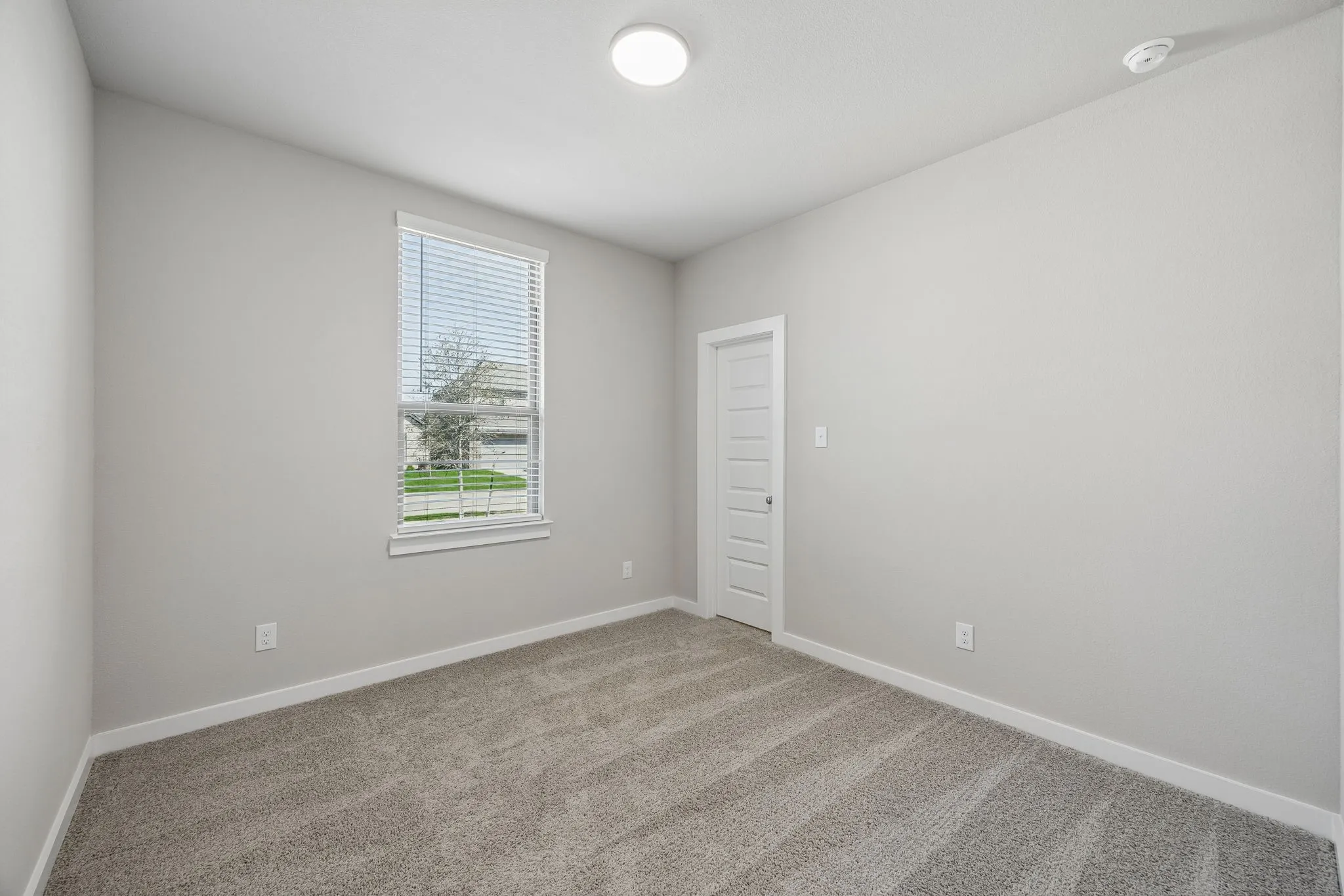 Bedroom in the Emmy II home plan - REPRESENTATIVE PHOTO
