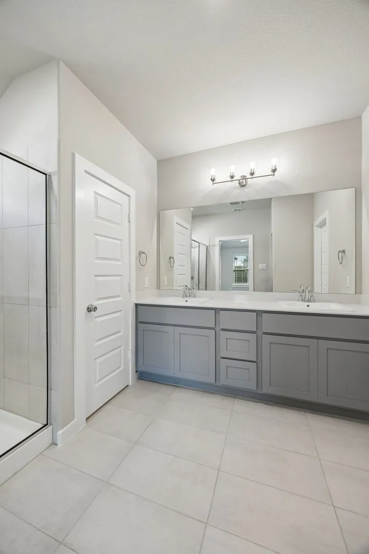 Primary Bathroom in the Emmy II home plan - REPRESENTATIVE PHOTO